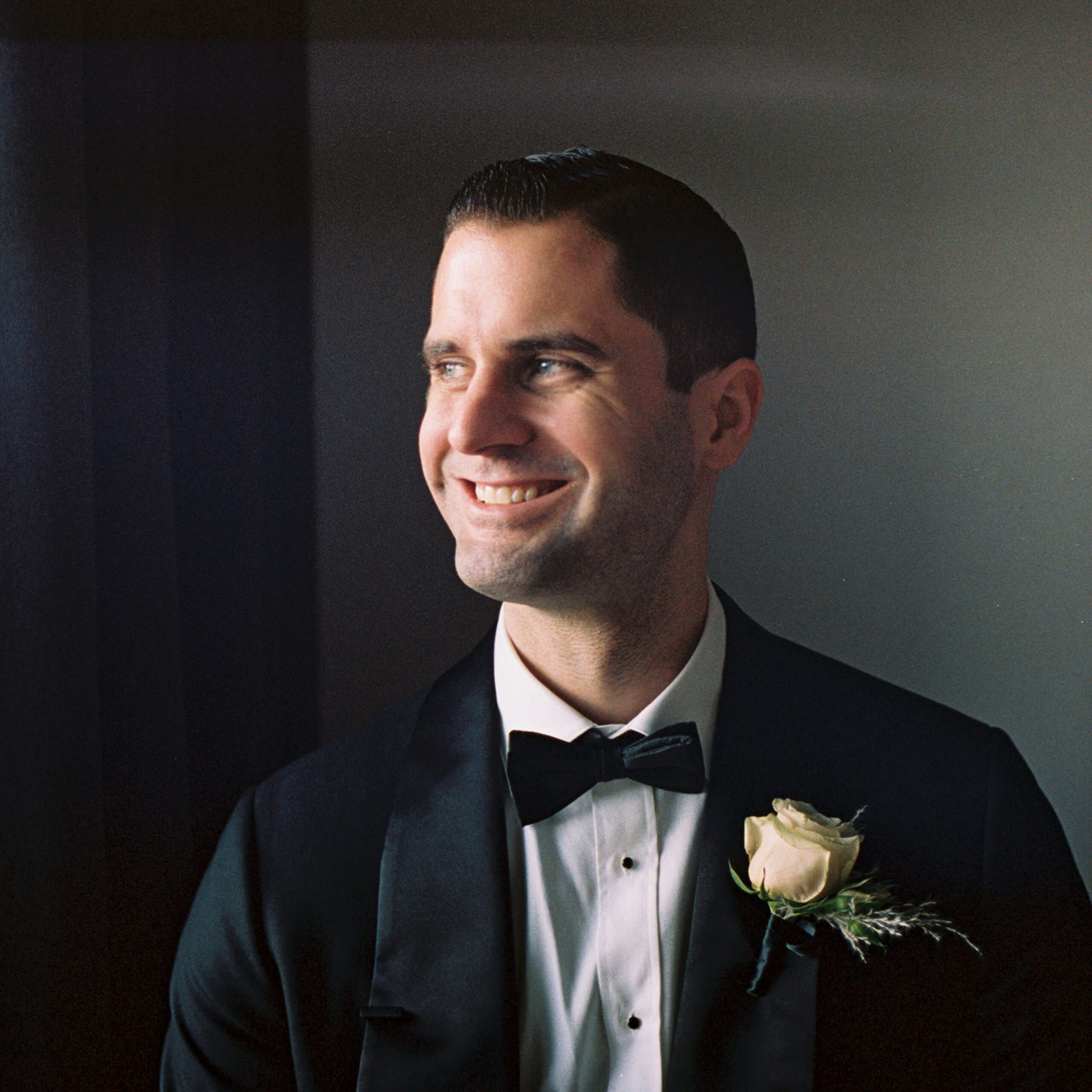 Headshot of the groom. Film wedding photography image by Jenny Fu Studio