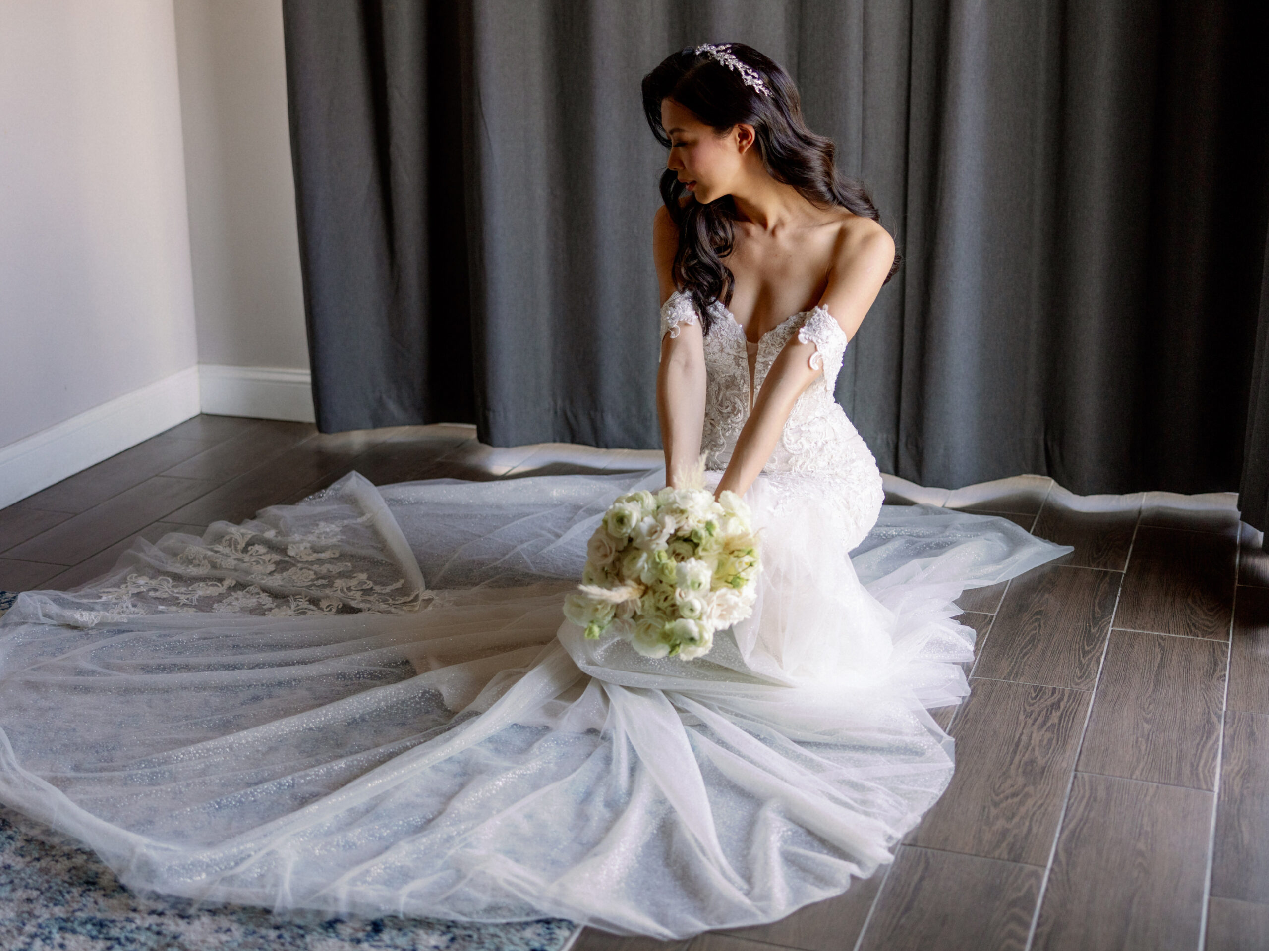 Portrait image of the bride in her beautiful wedding dress. Honeymoon destination image by Jenny Fu Studio