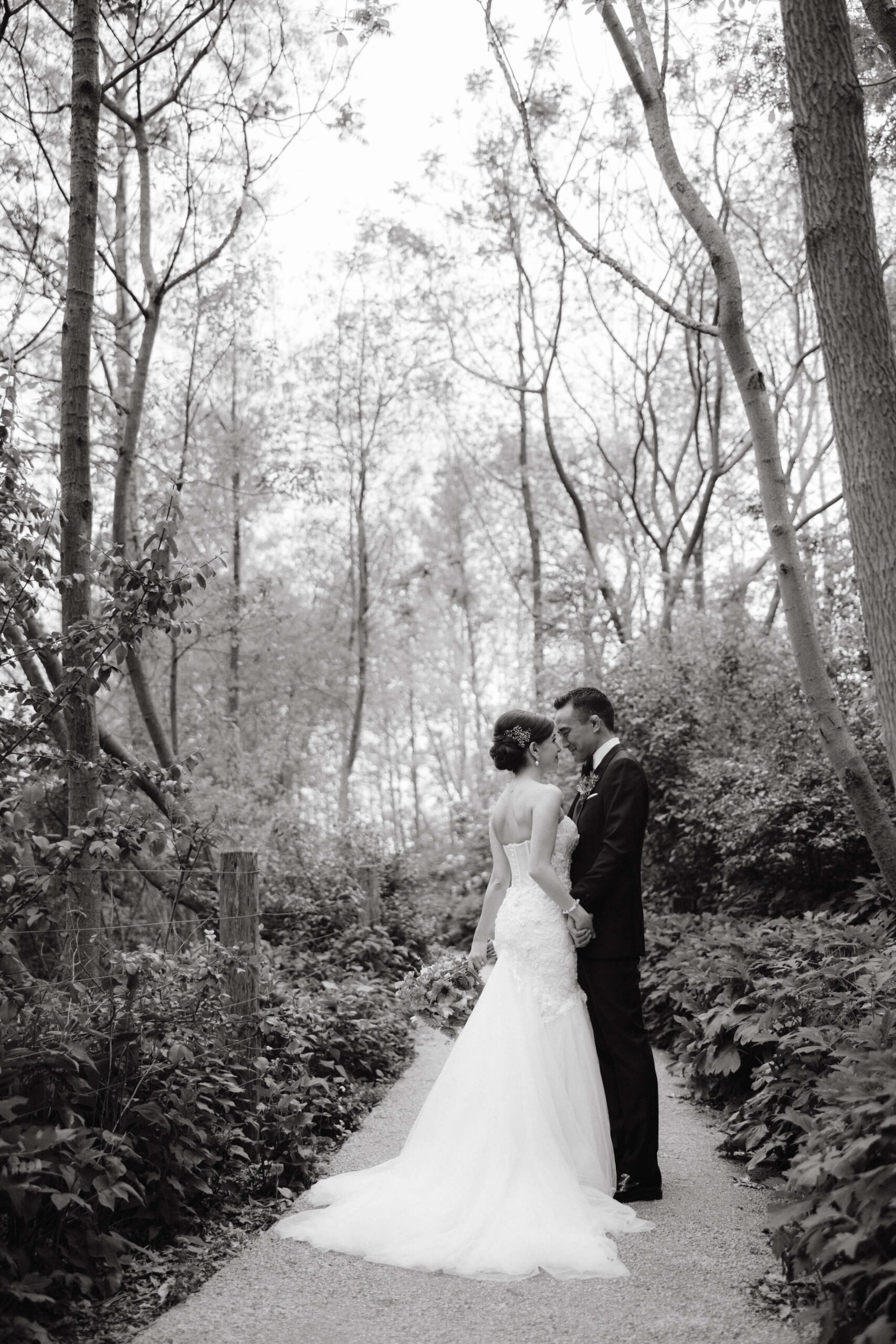 Editorial photo of the couple in the woods. Image by Jenny Fu Studio