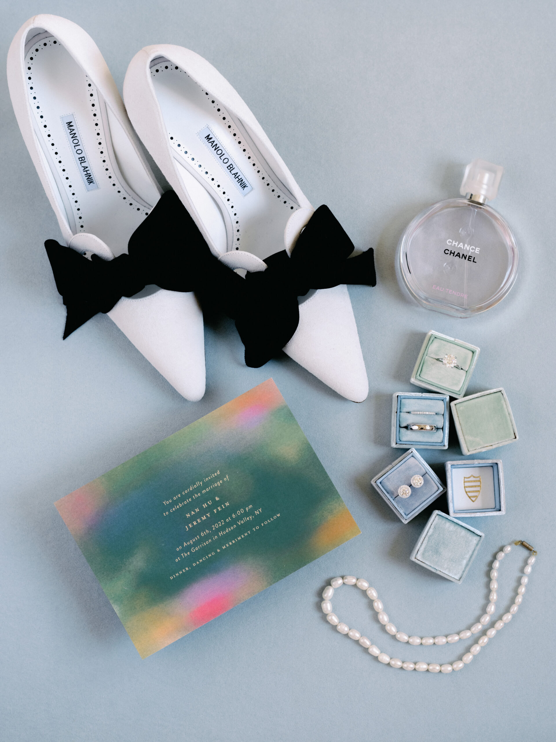 Photo of the bride's shoes, jewelry, and invitation. Fine art wedding photography image by Jenny Fu Studio