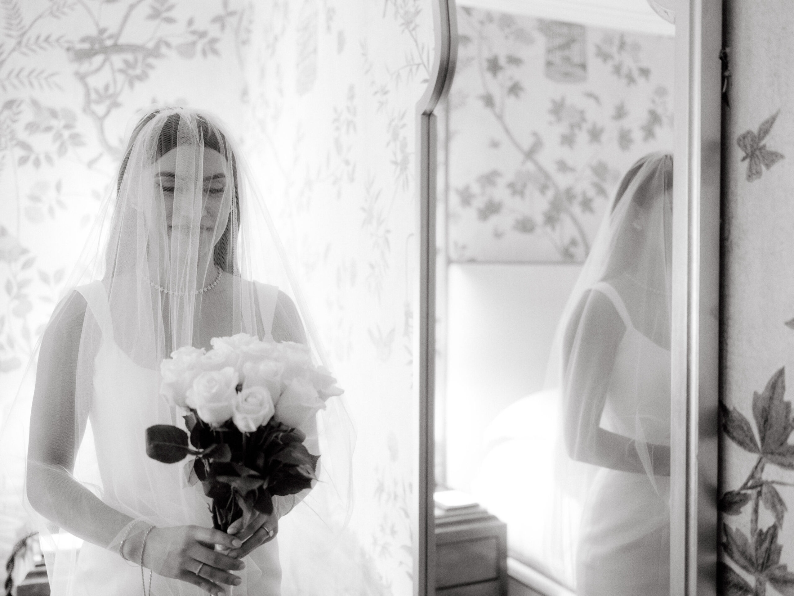 Black and white image of the bride wearing her wedding dress. The most beautiful wedding photos image by Jenny Fu Studio