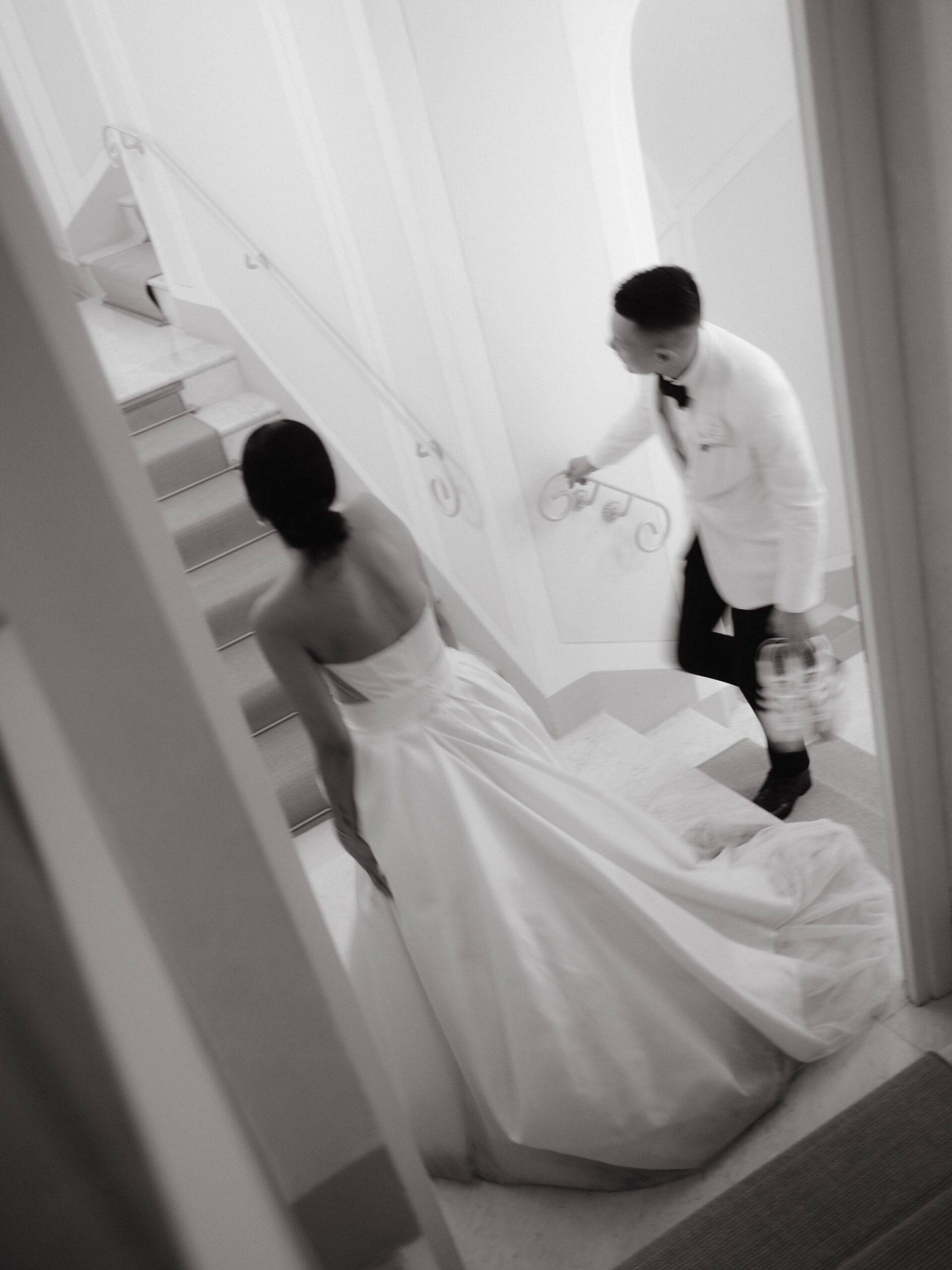 Black and white image of the newlyweds inside Hotel Caruso Belmond, Italy. Image by Jenny Fu Studio