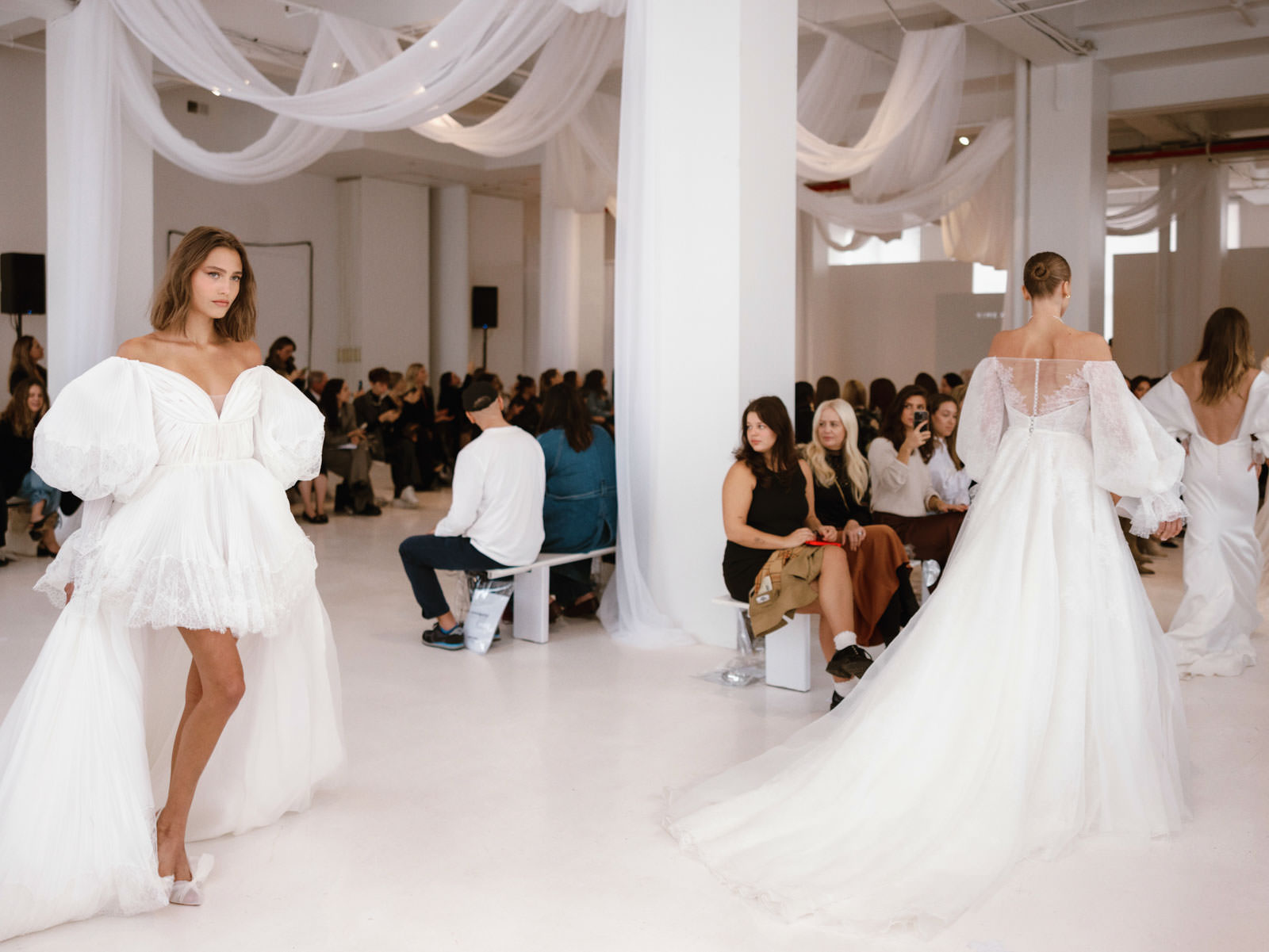 Models walking in the runway at the New York Bridal Fashion Week. Image by Jenny Fu Studio