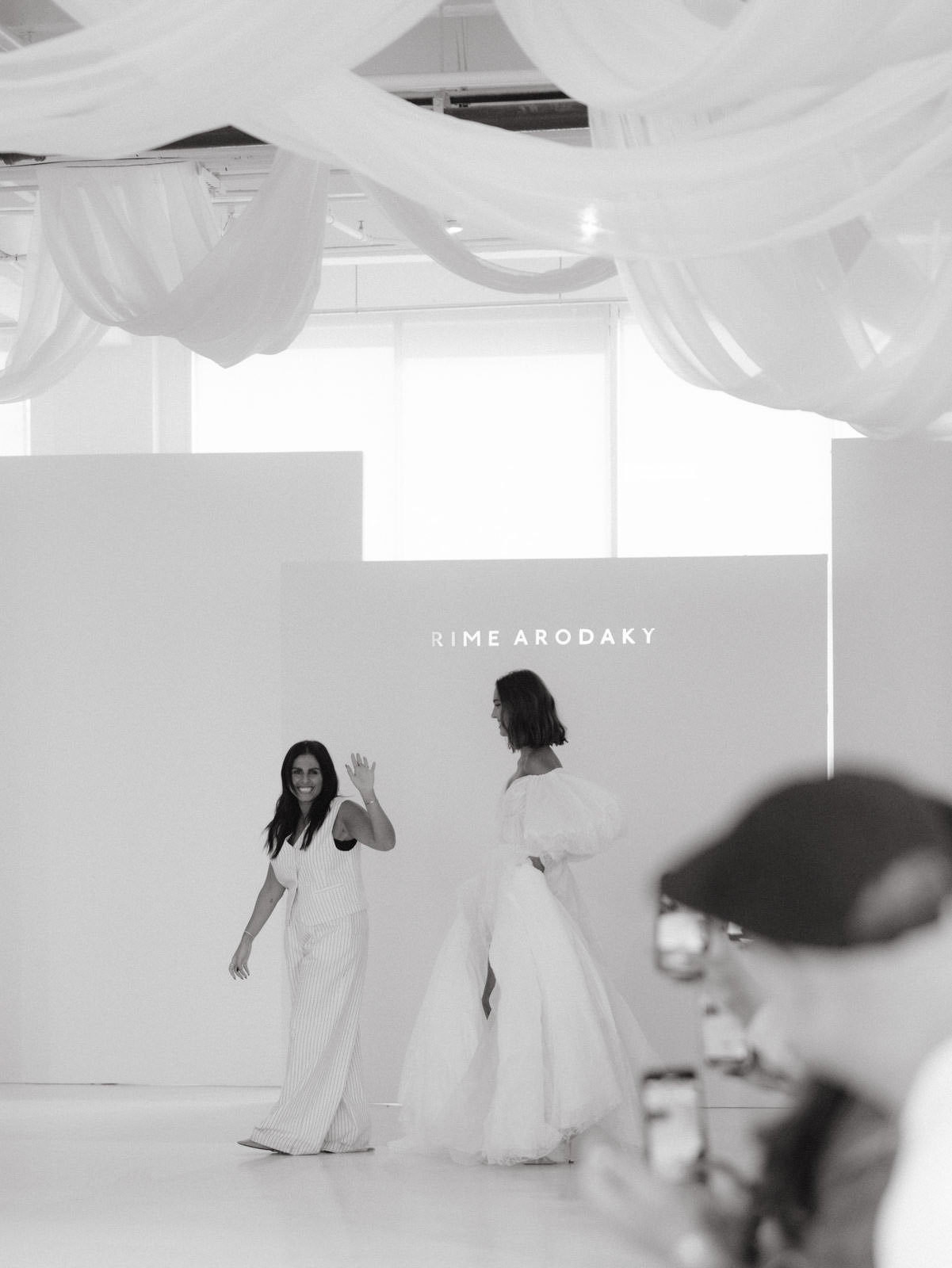Editorial photo of models wearing wedding dresses by Rime Arodaky at the NYBFW. Image by Jenny Fu Studio