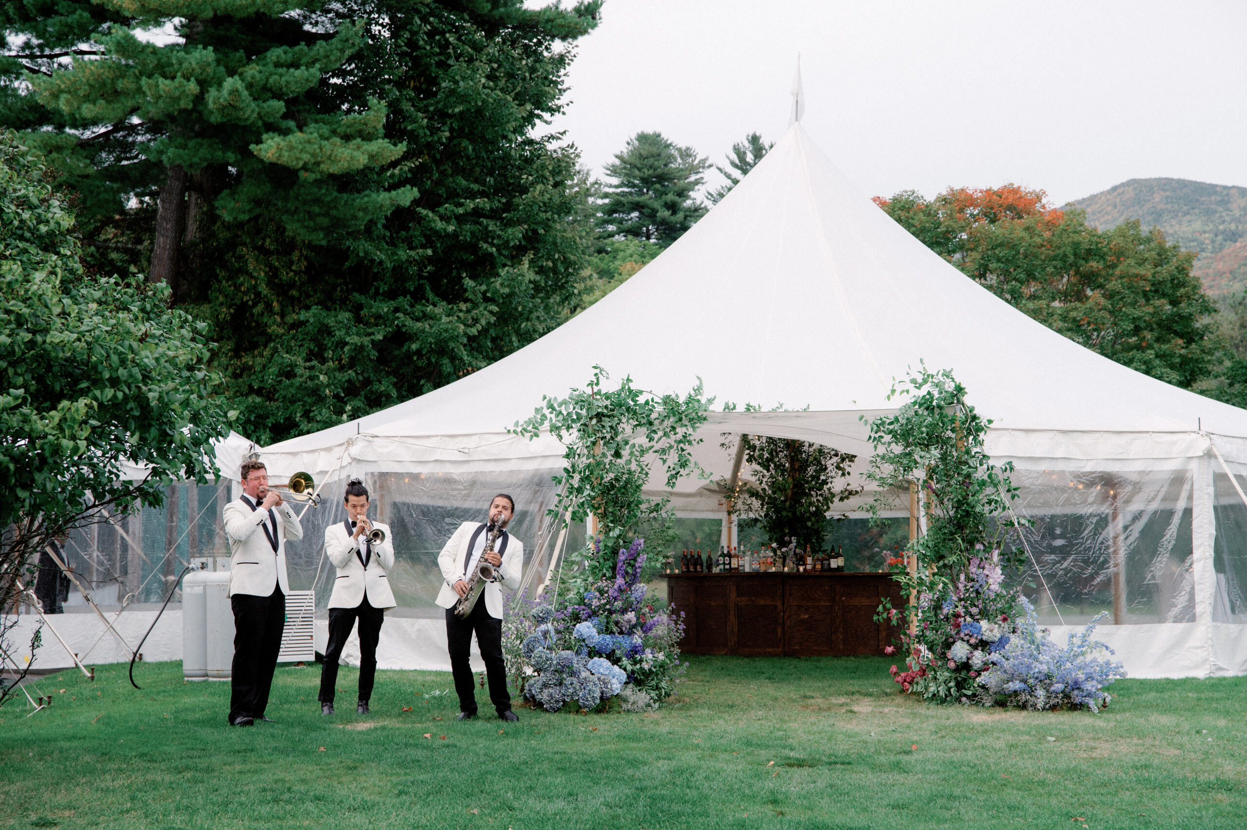 Men playing musical instruments at an upstate New York wedding. Image by Jenny Fu Studio
