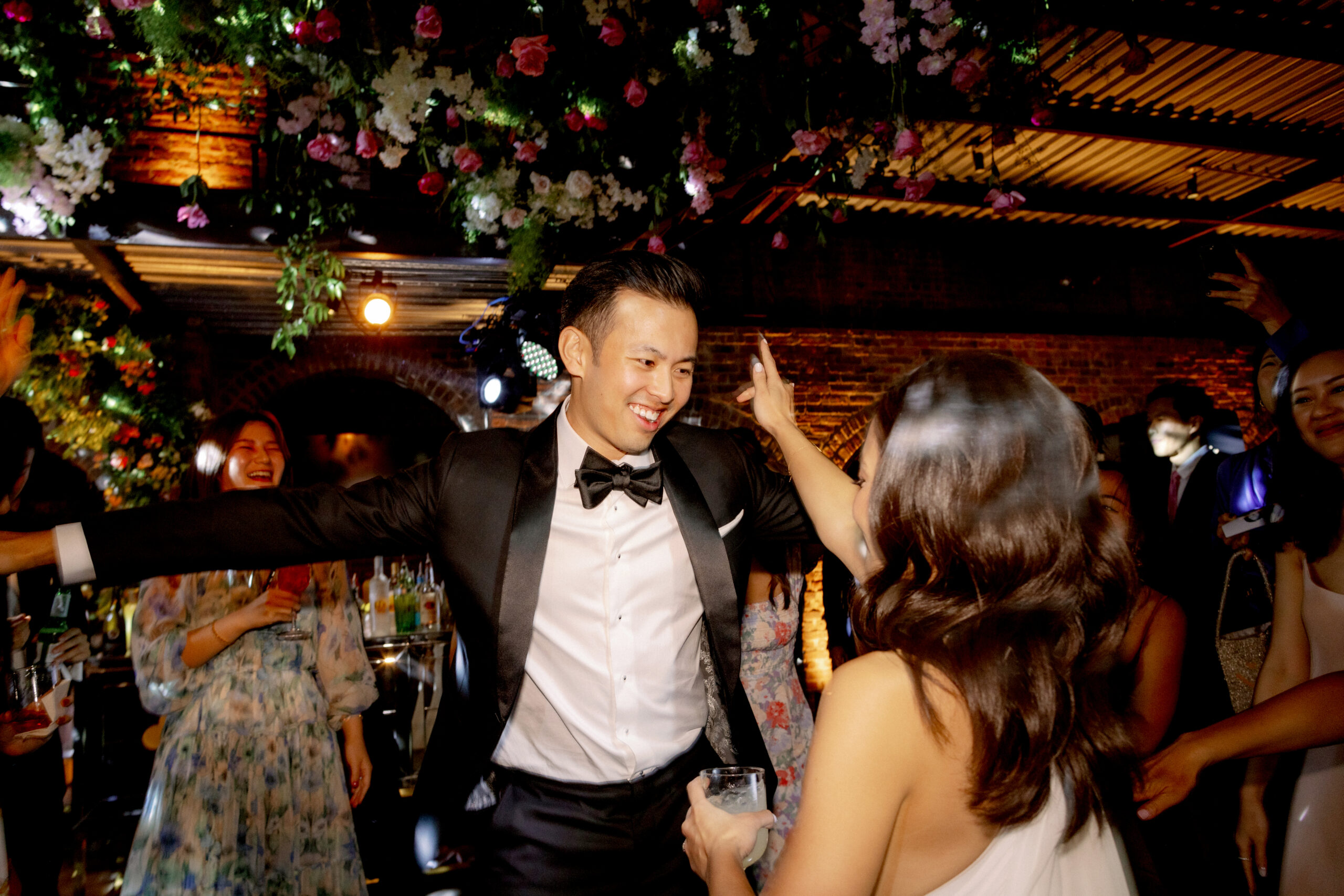 The newlyweds are happily dancing the night away. Image by Jenny Fu Studio