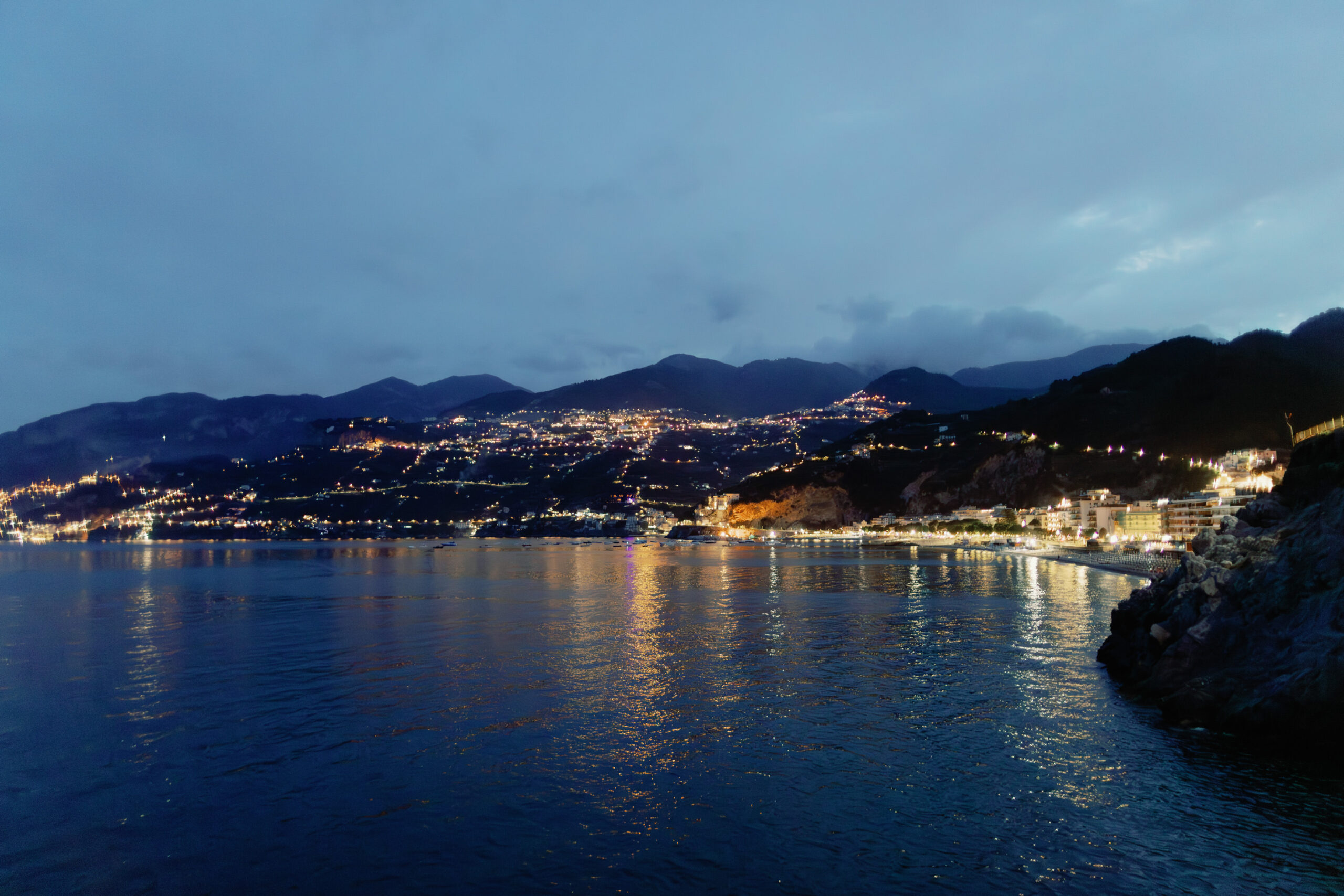 Night time view of the beautiful Amalfi Coast in Italy. Image by Jenny Fu Studio