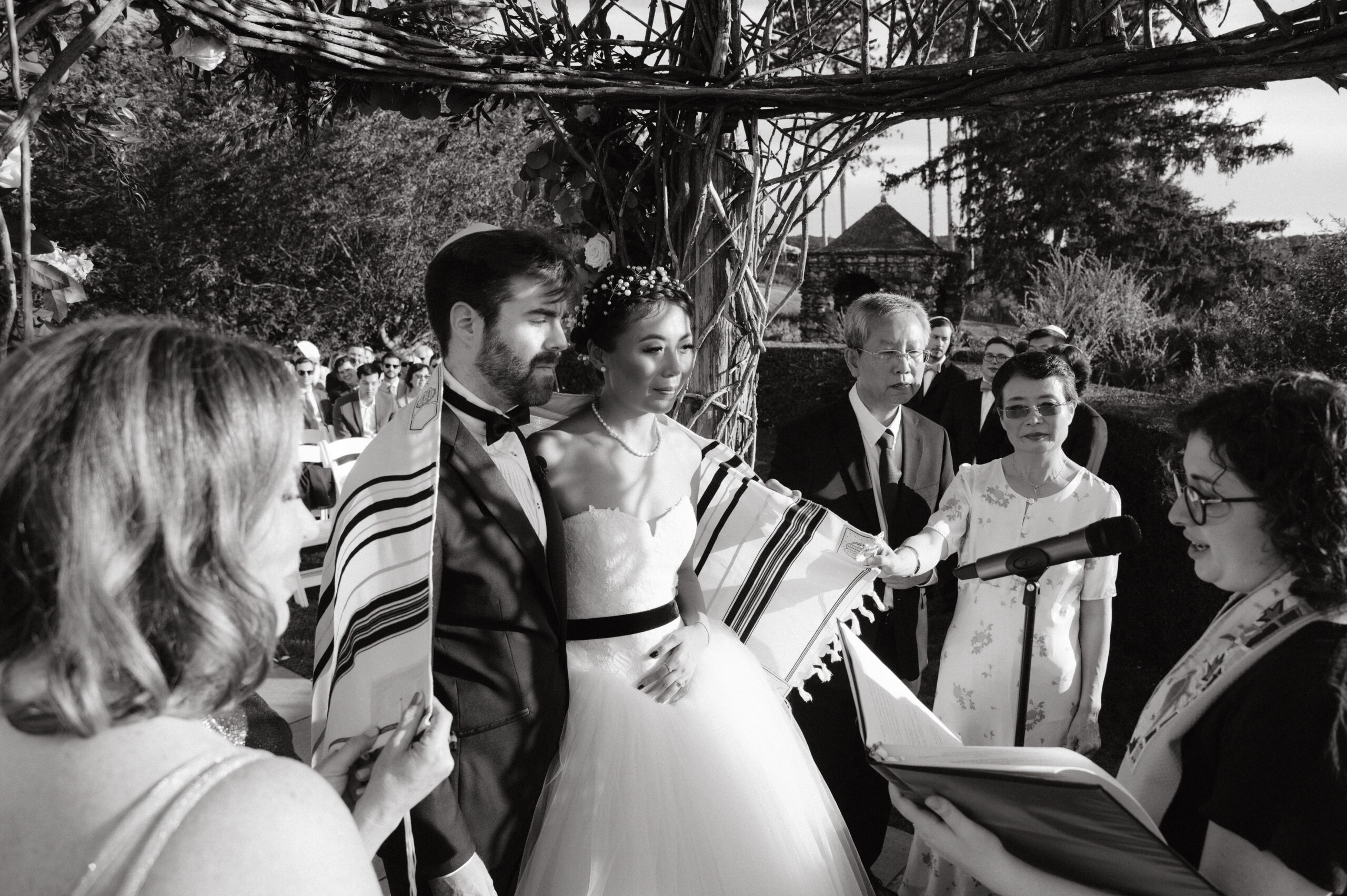 Editorial wedding ceremony photo. Black and white wedding photography image by Jenny Fu Studio