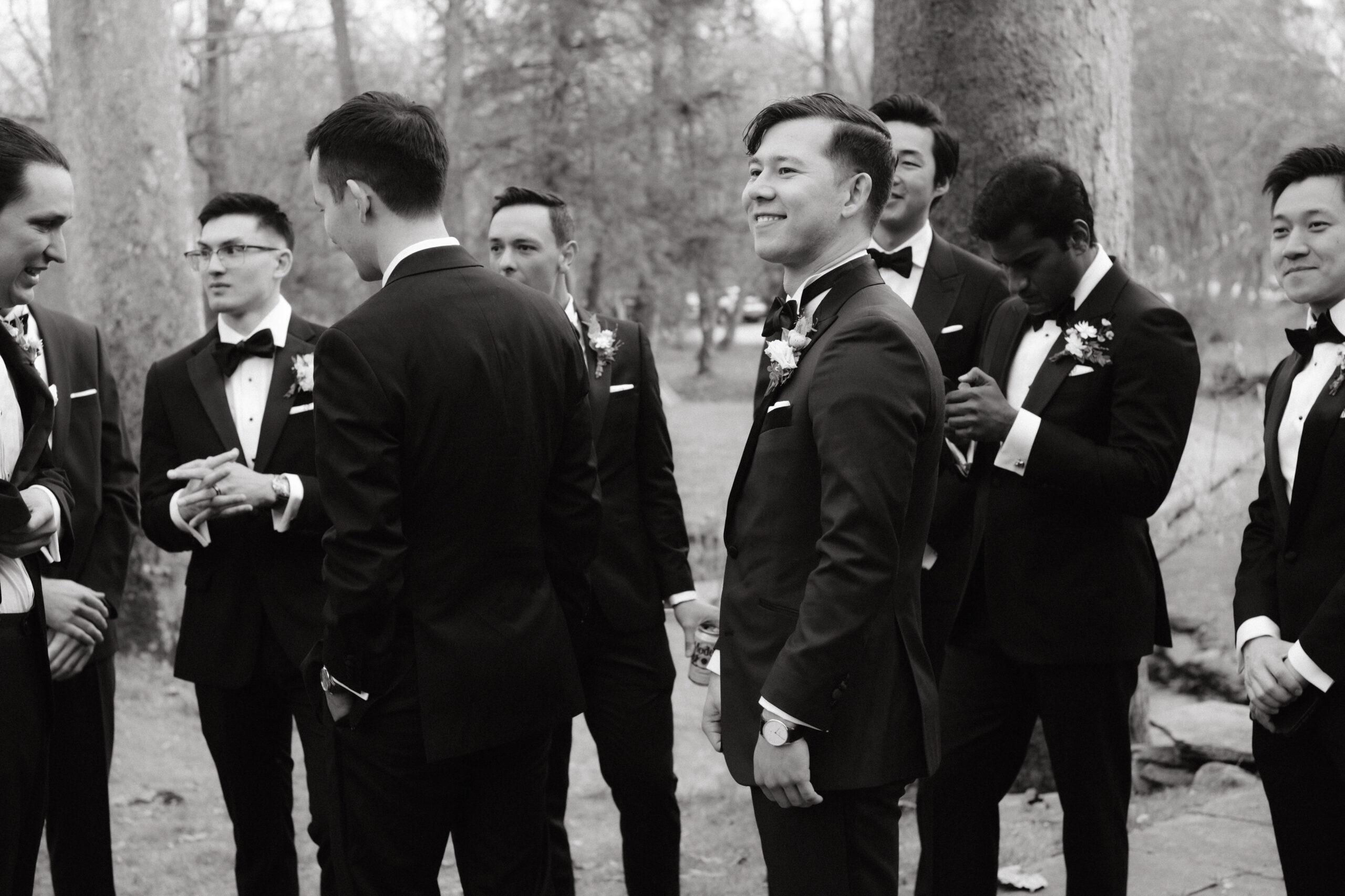 Black and white image of the groom with groomsmen waiting for the bride. Image by Jenny Fu Studio