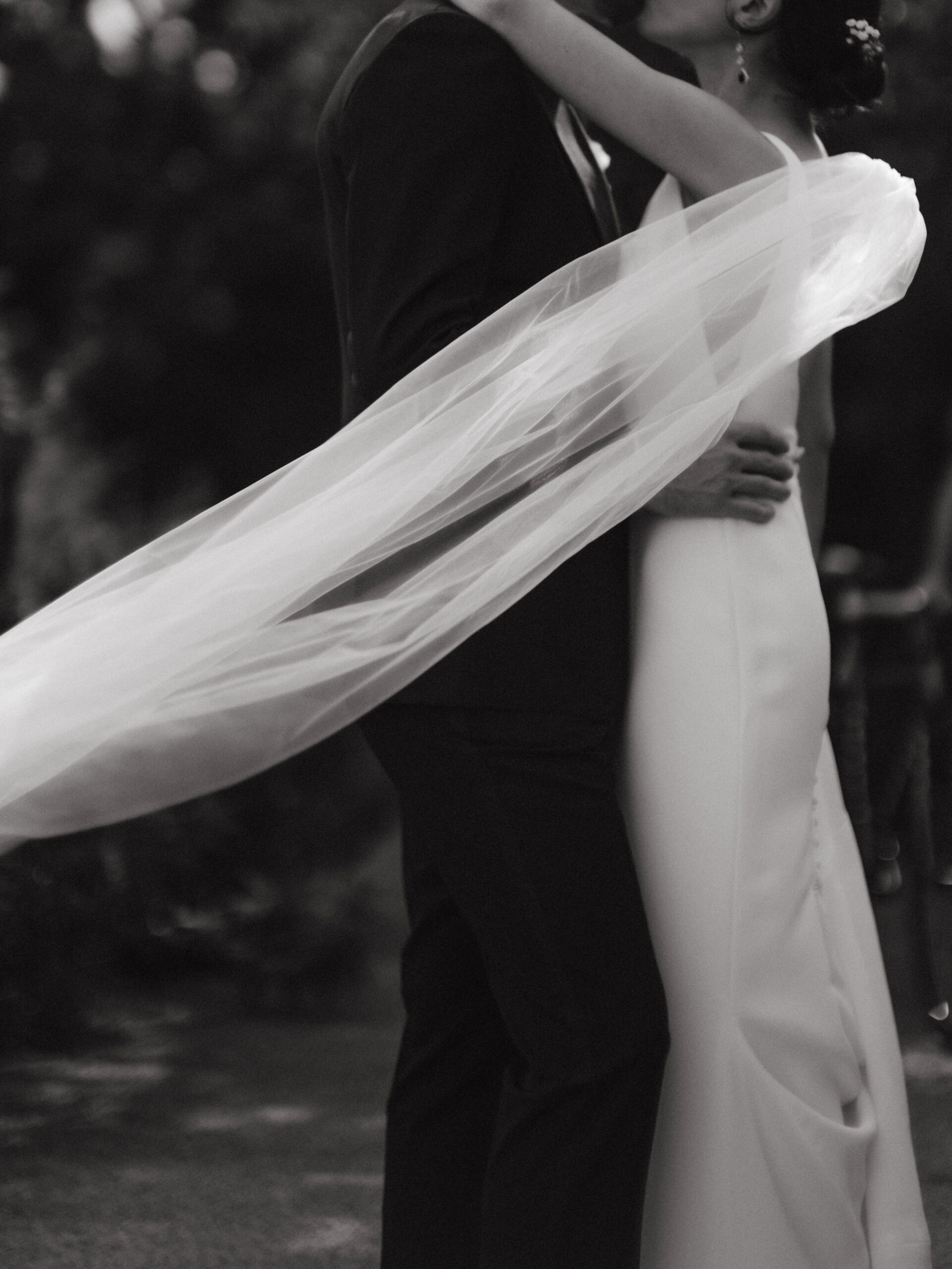 Black and white documentary wedding photography image by Jenny Fu Studio. 