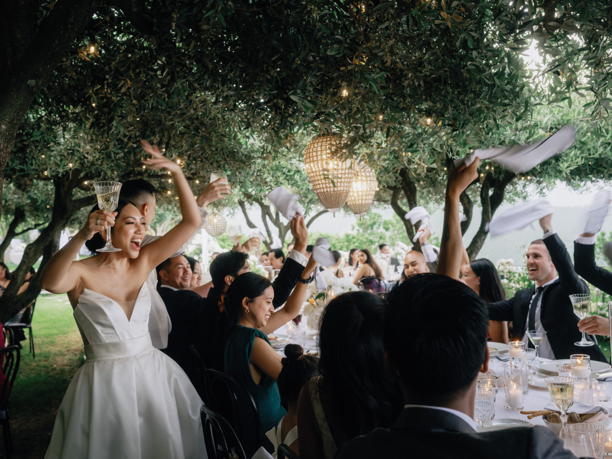 The newlyweds and guests are having fun in the wedding reception at Ravello, Italy. Image by Jenny Fu Studio