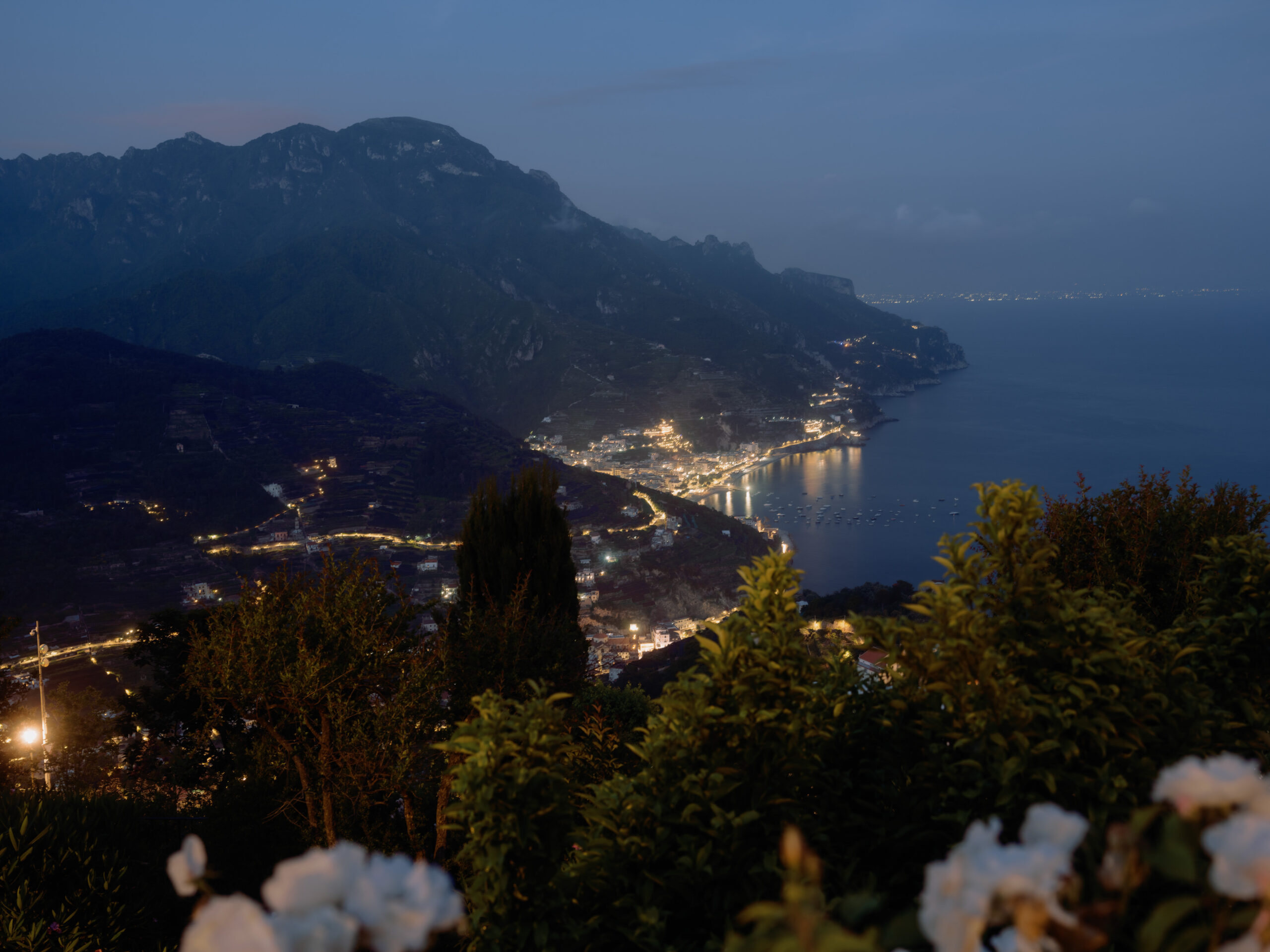 Night view of mountain and lake in Ravello, Italy. Image by Jenny Fu Studio