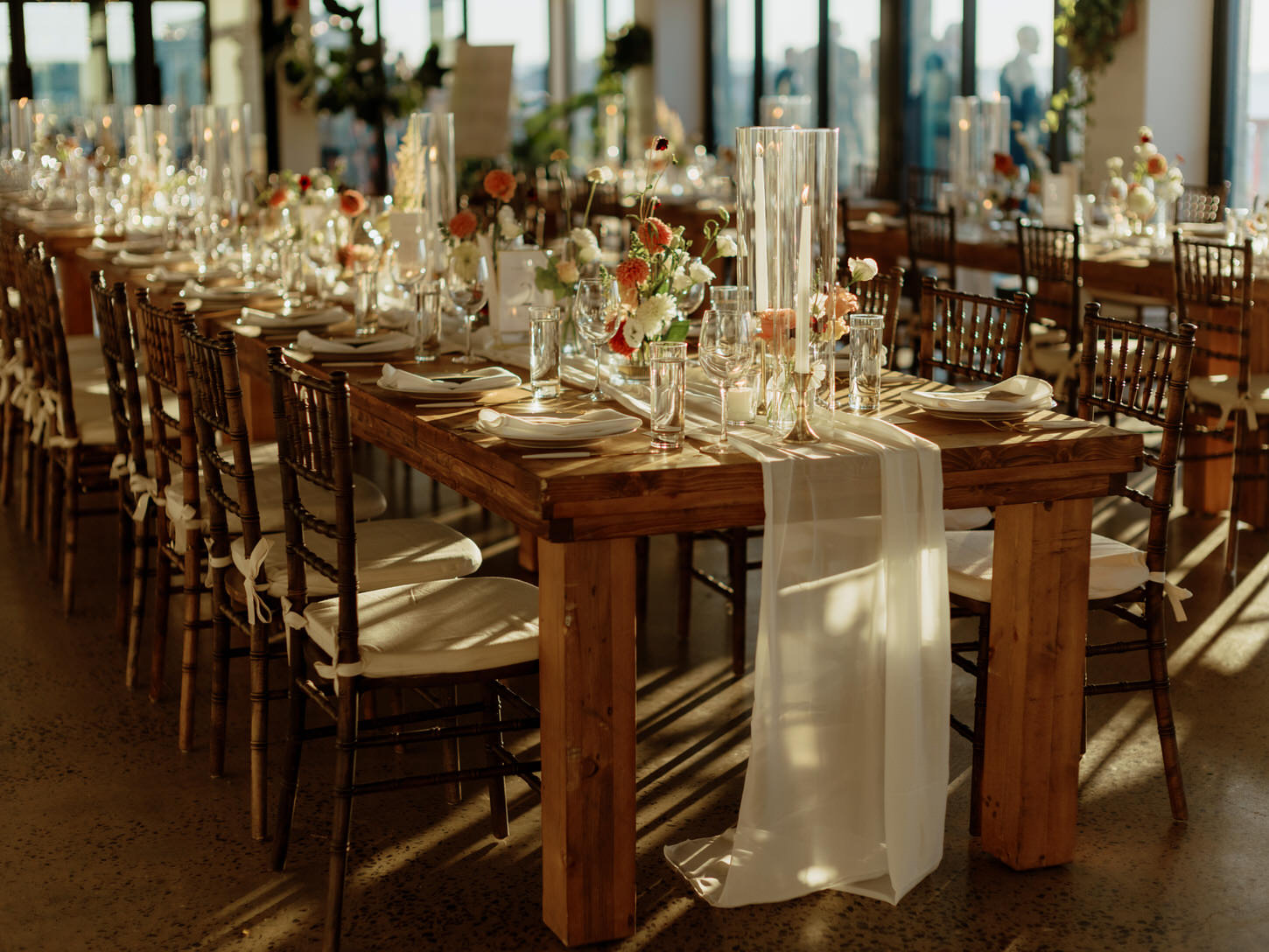 An luxurious wedding reception table set-up at Brooklyn Grange NYC. Image by Jenny Fu Studio