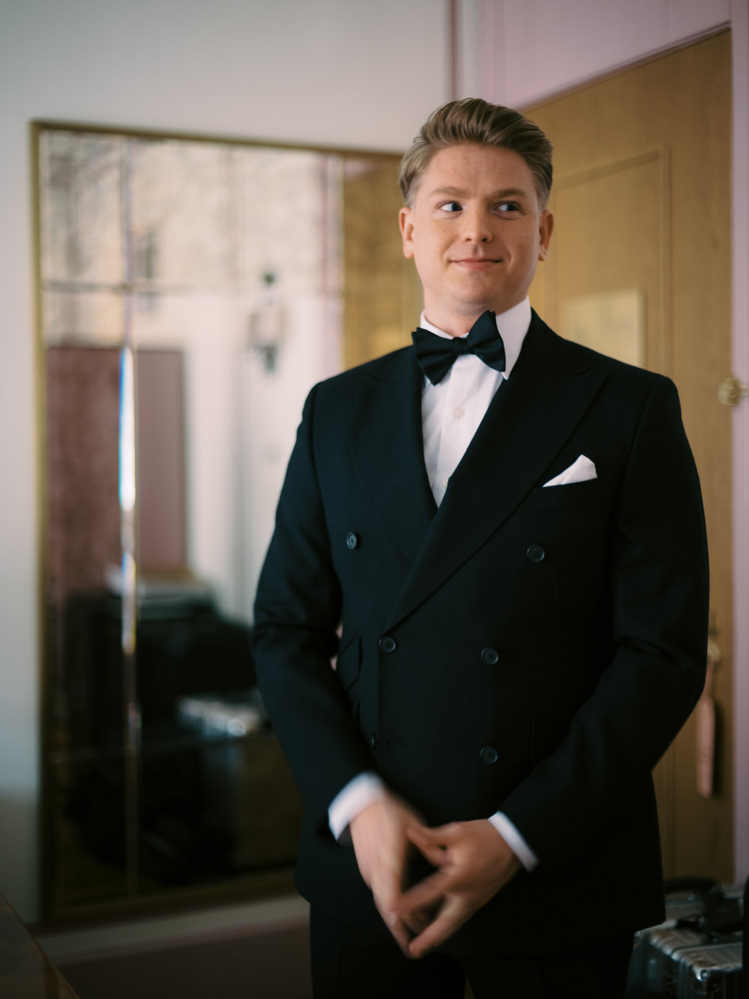 A getting-ready portrait of the groom at Hotel Fouquet, NYC, captured perfectly by Jenny Fu Studio's lenses.