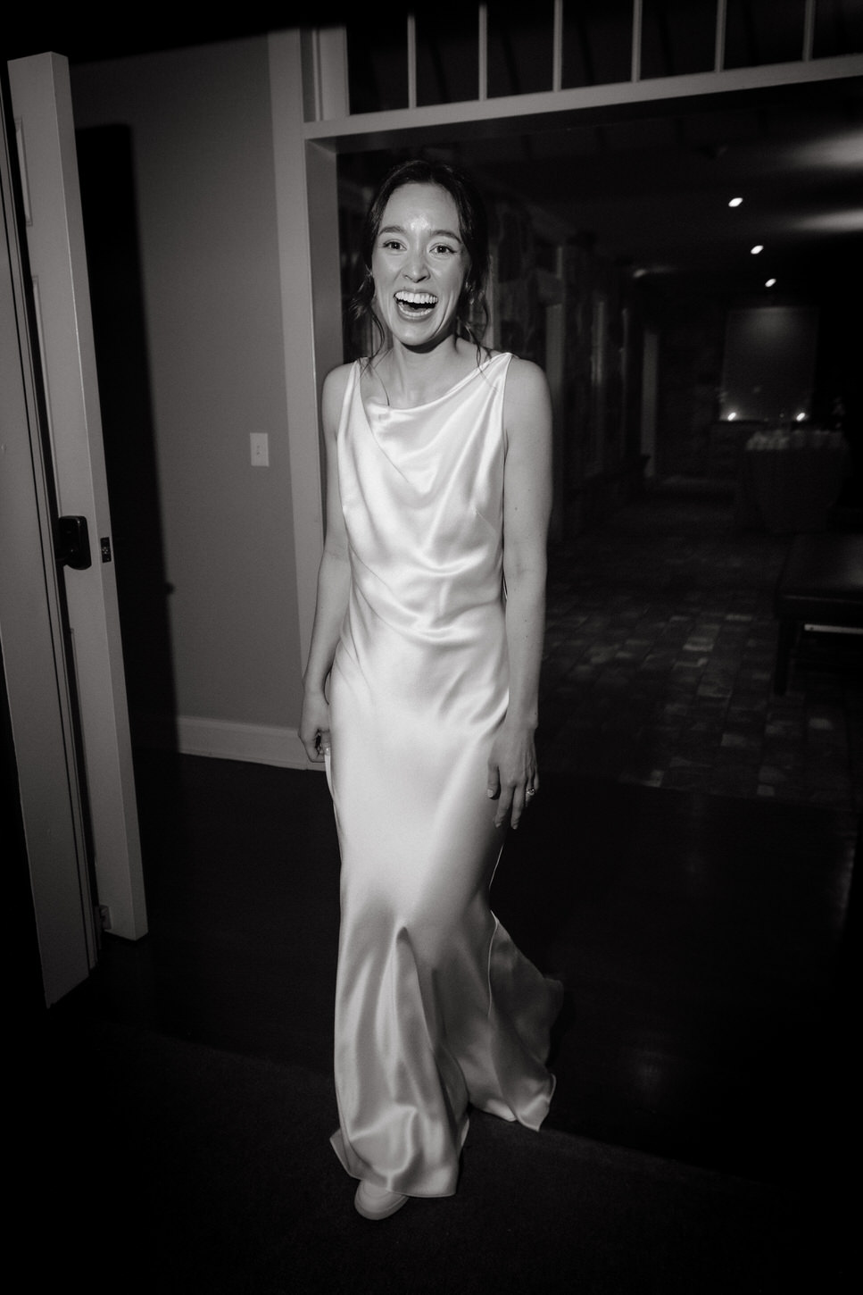 The fabulous bride  changed outfit for the reception. Photojournalistic image by Jenny Fu Studio