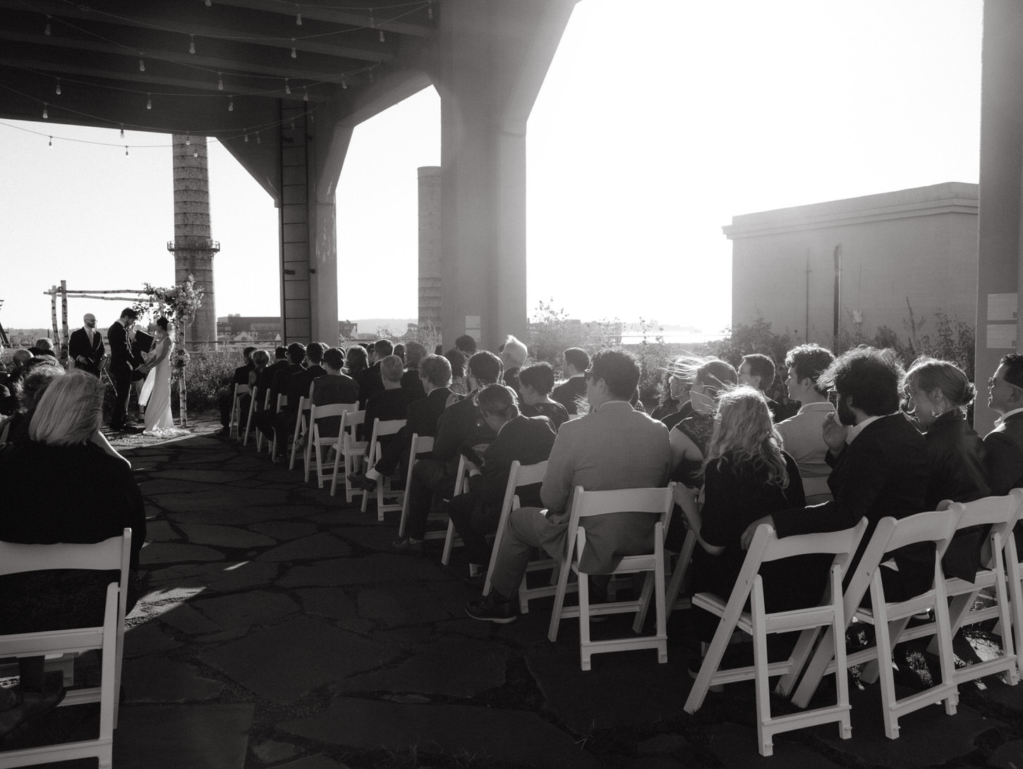 Black and white candid special image of the wedding ceremony shot by Jenny Fu Studio.