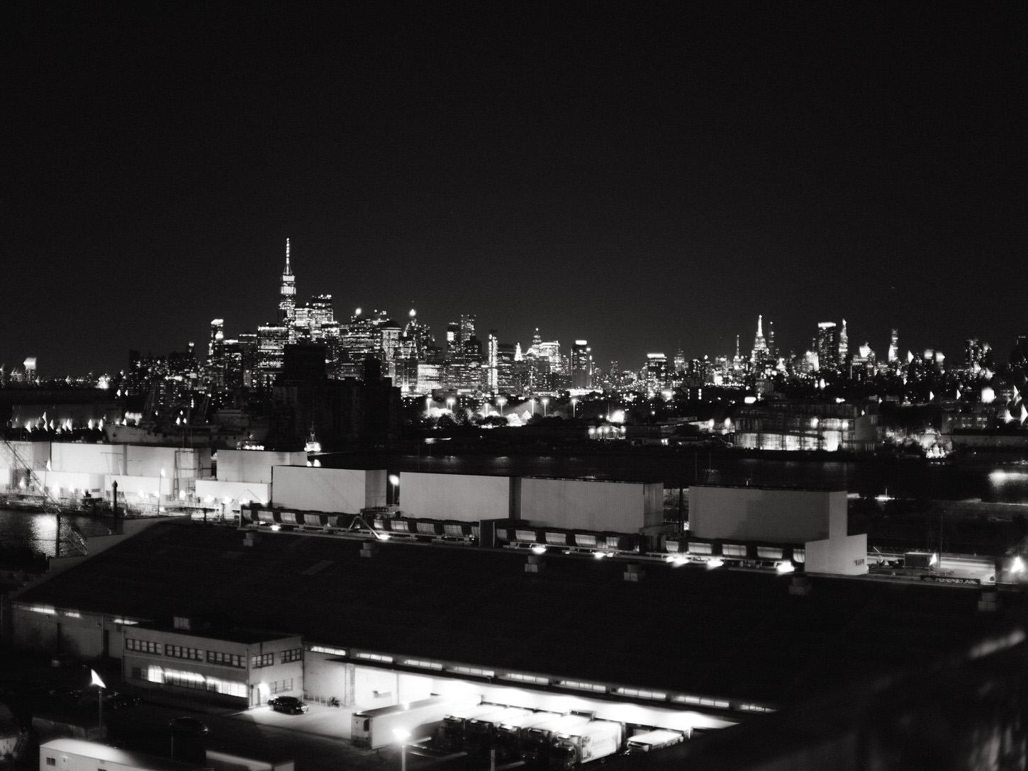 A special image of the NYC skyline at night perfectly captured by Jenny Fu Studio.