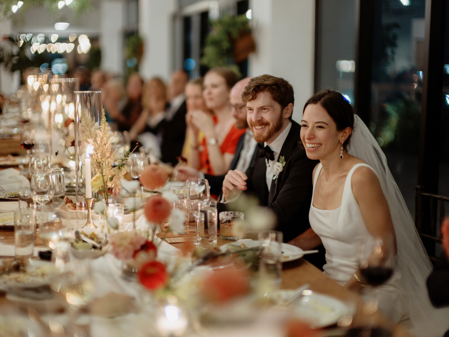 The newlyweds are having fun at the wedding reception while eating dinner and watching the program, candidly shot by Jenny Fu Studio. 