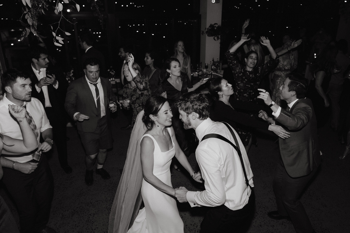 The newlyweds and guests are dancing to the beat, captured by Jenny Fu Studio in Brooklyn Grange, NY