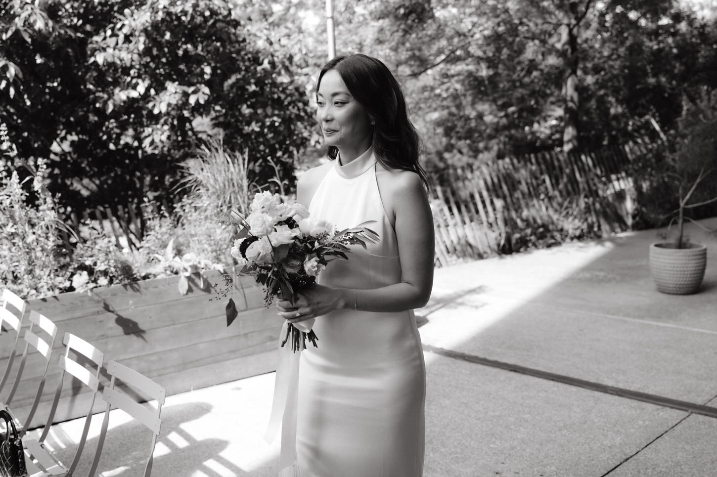 The gorgeous bride is about to walk in the aisle for her elegant wedding, captured by Jenny Fu Studio.