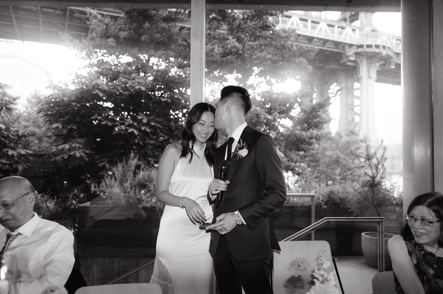 The newlyweds are having a sweet moment in their wedding reception at Celestine, Brooklyn, NYC, captured by Jenny Fu Studio.