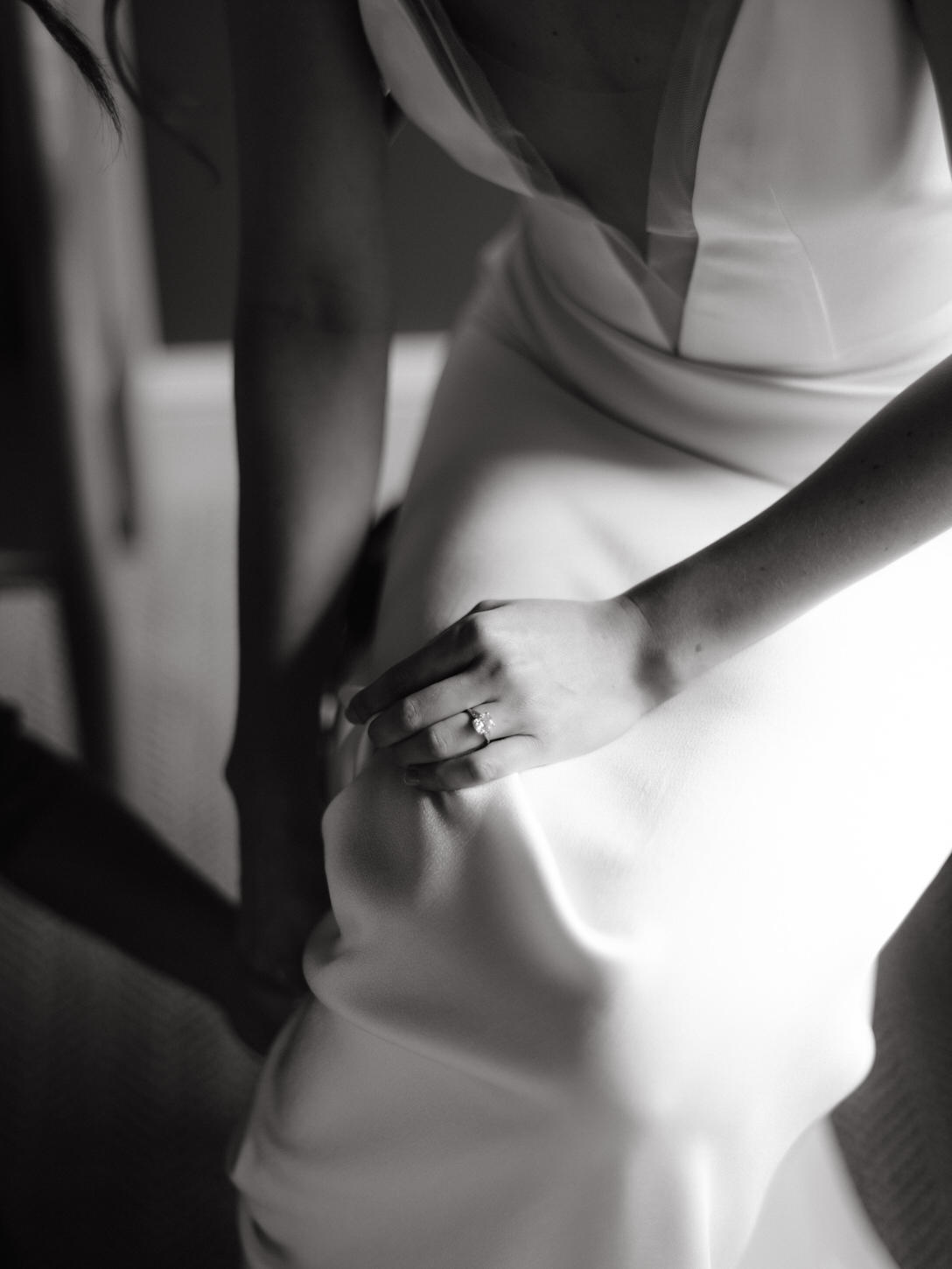 Black and white image of the bride's wedding dress captured by Jenny Fu Studio.