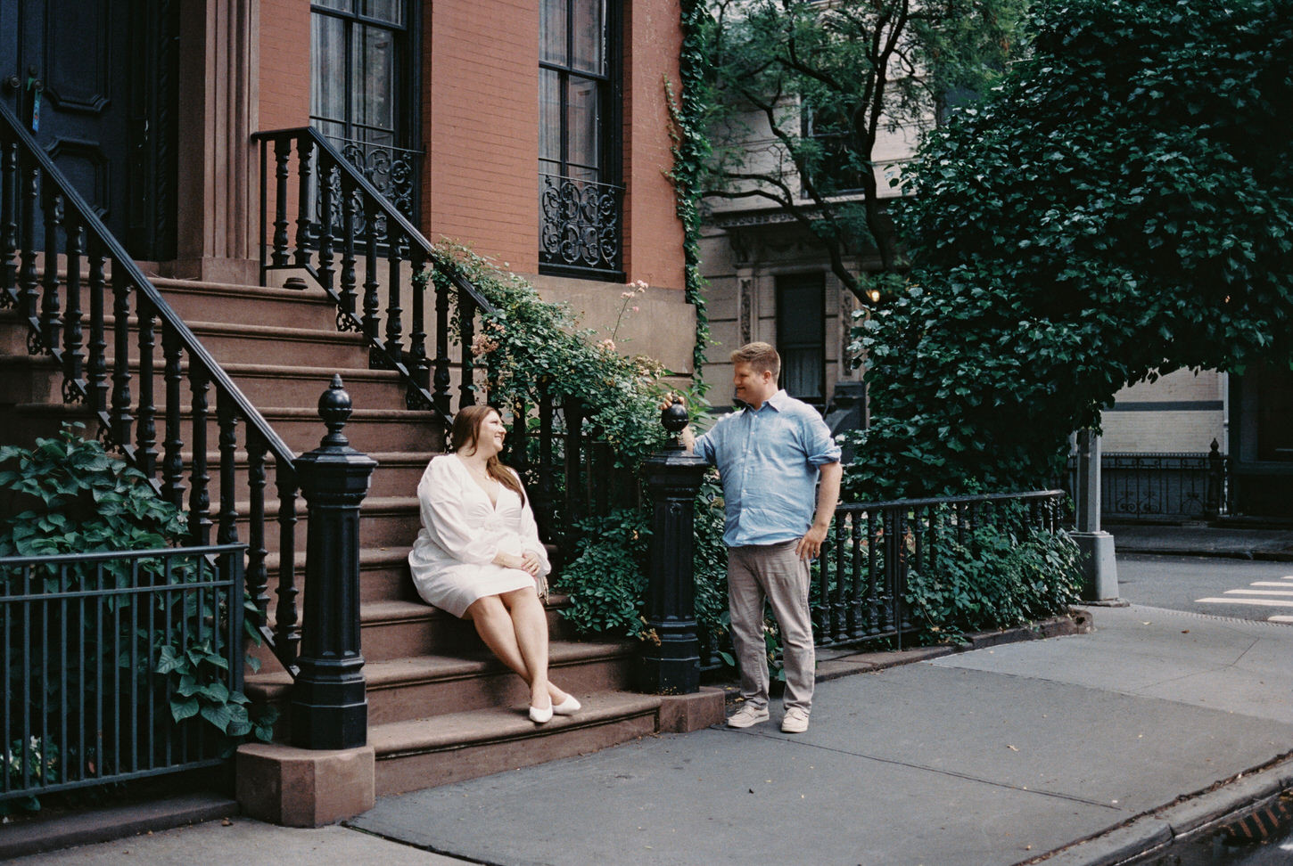 The engaged couple is lovingly staring at each other, wonderfully captured by Jenny Fu Studio.