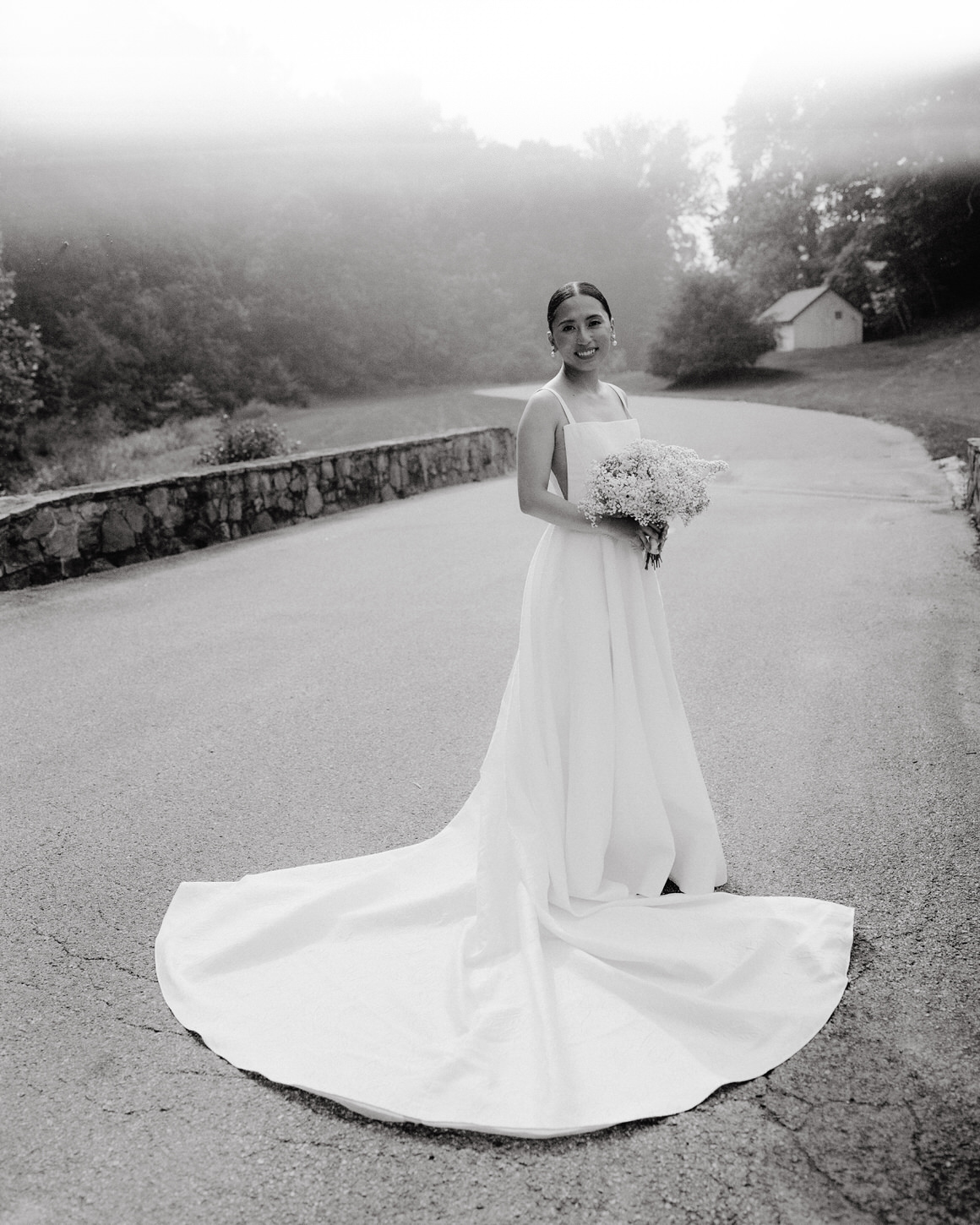 A beautiful portrait of the bride outdoors with vintage charm using film photography by Jenny Fu Studio.