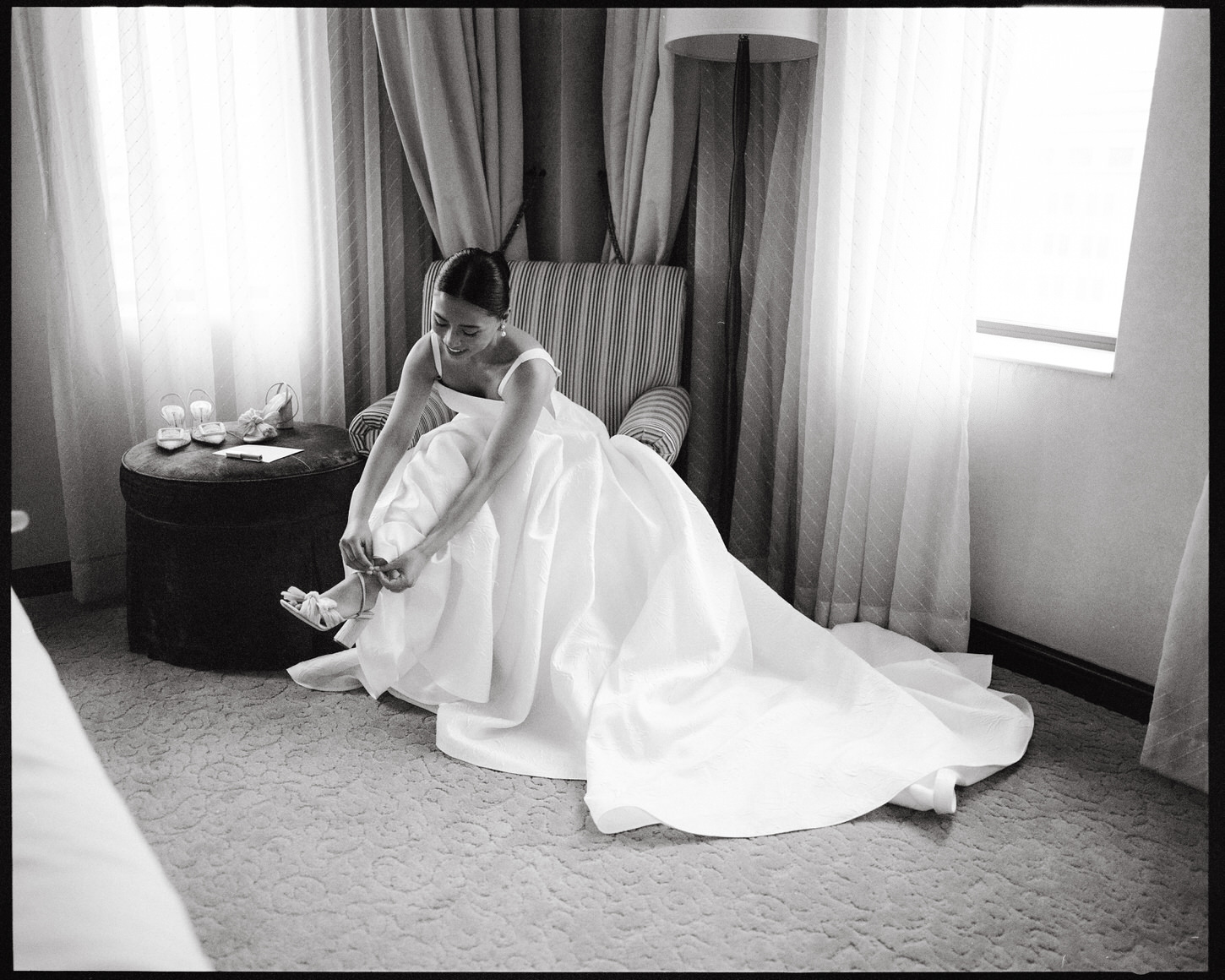 A hybrid wedding photography image of the bride getting ready for her wedding, captured by Jenny Fu Studio.