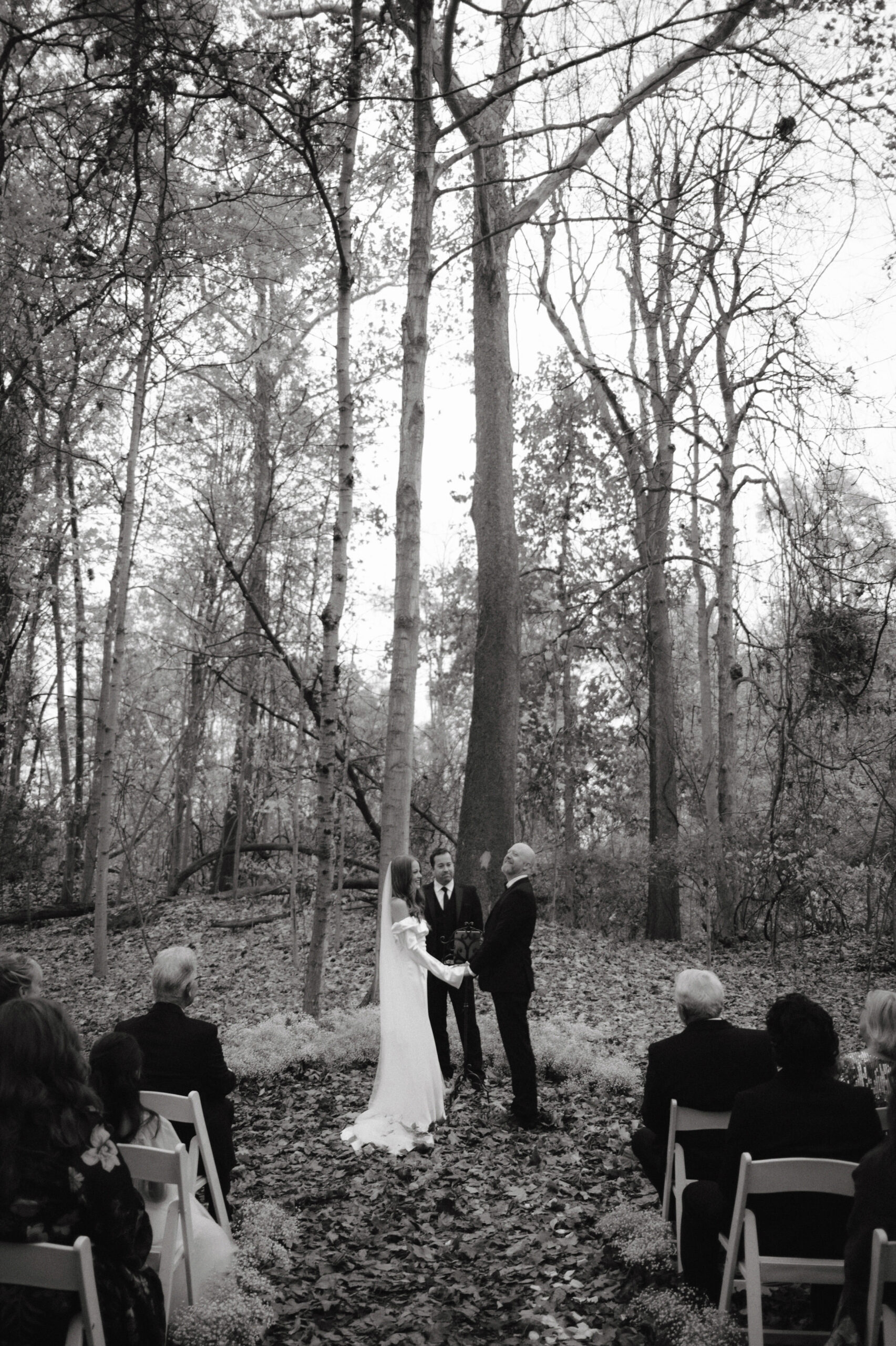 Black and white image of the wedding ceremony captured by Jenny Fu Studio for a luxury wedding album.