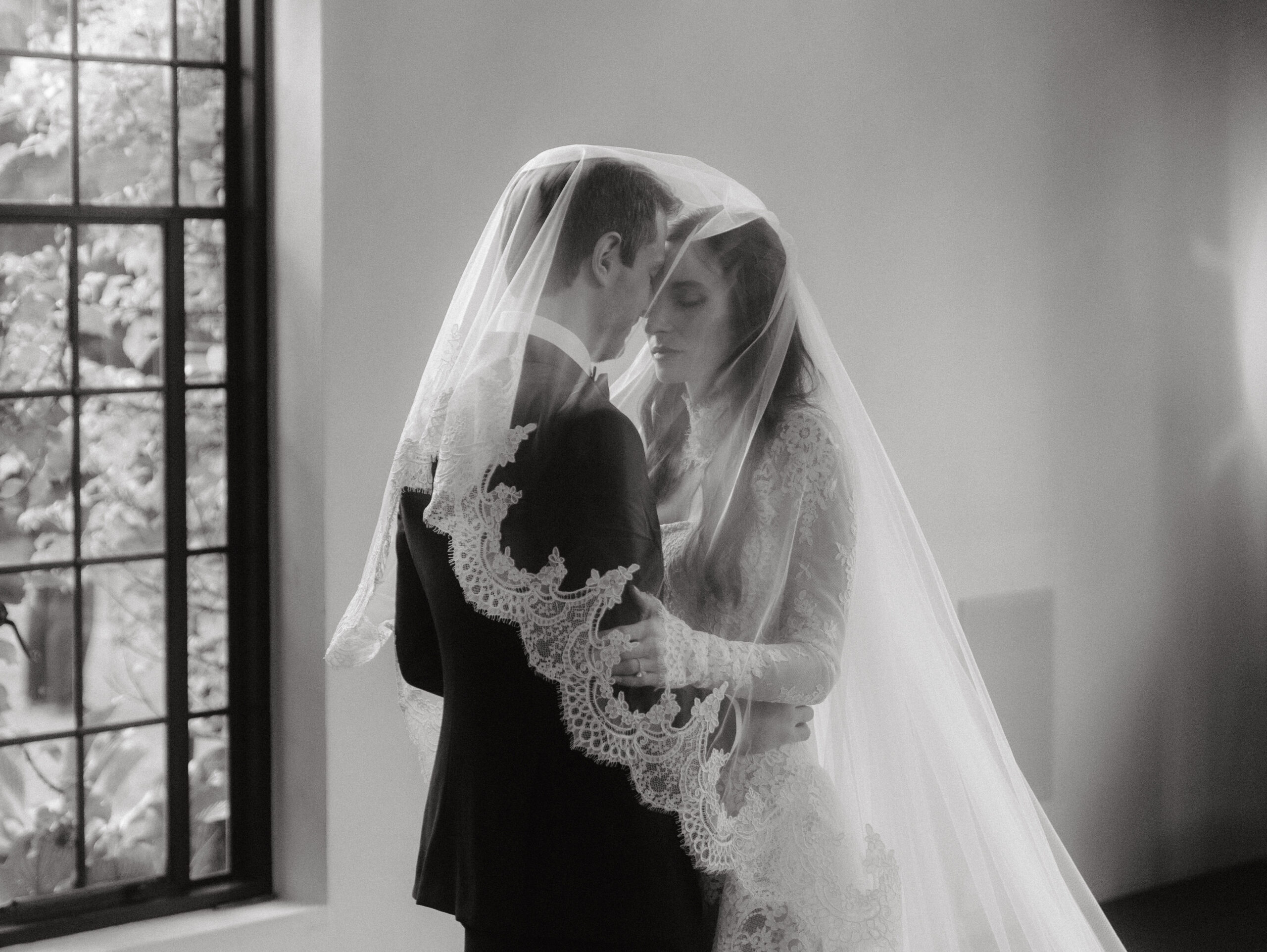 Emotional Black and white photo of the bride and groom captured by Jenny Fu Studio.