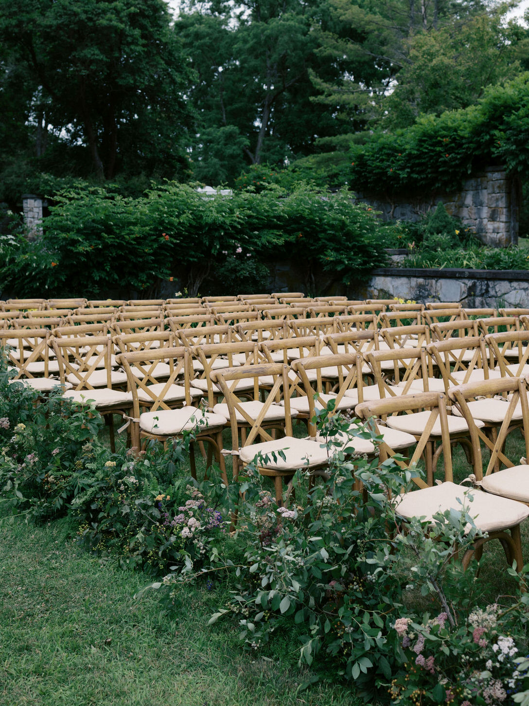 Outdoor wedding ceremony setup in the Upstate New York's exclusive wedding venues captured by Jenny Fu Studio.