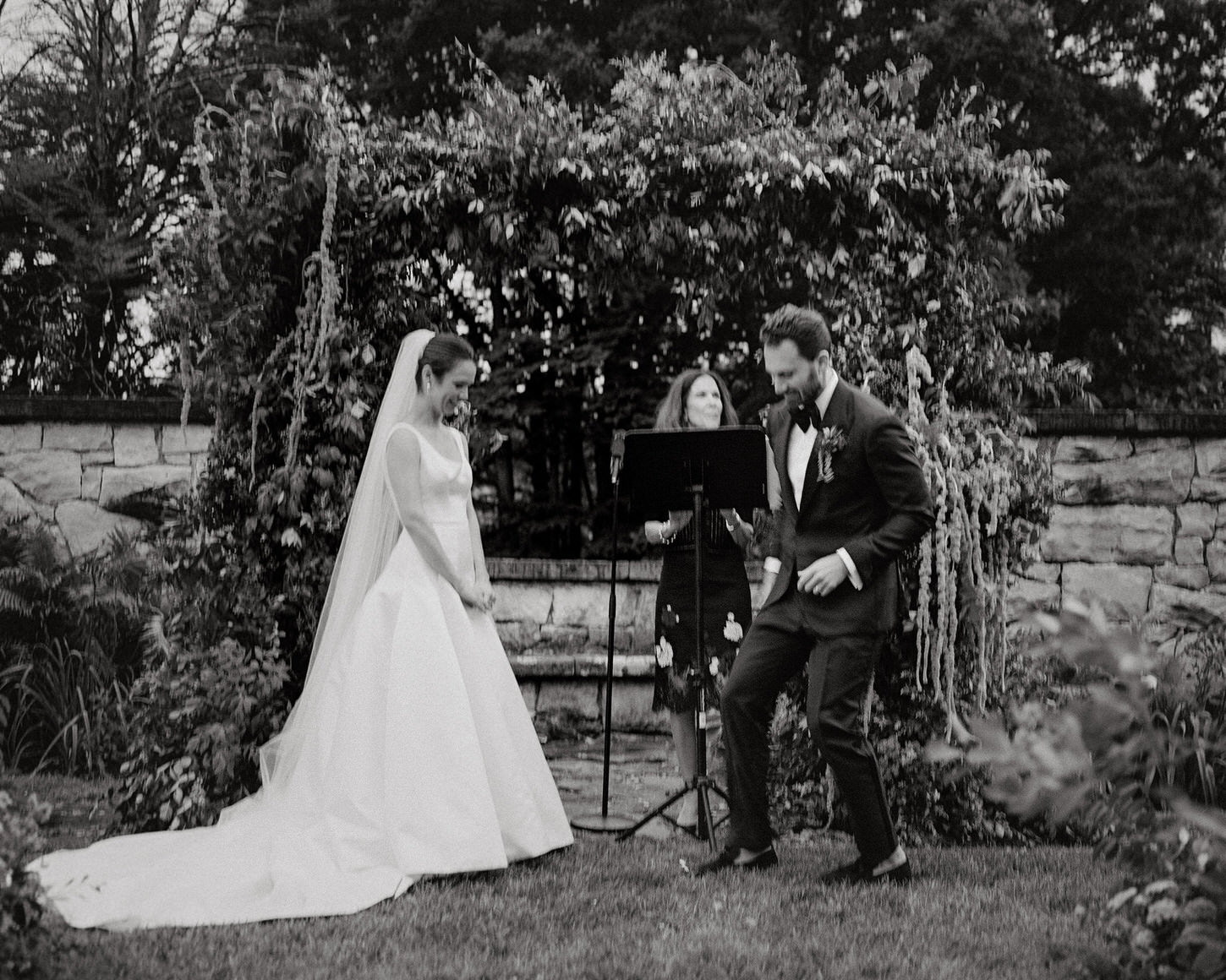 The bride and groom's emotions are captured in the wedding ceremony in Upstate New York, by Jenny Fu Studio.