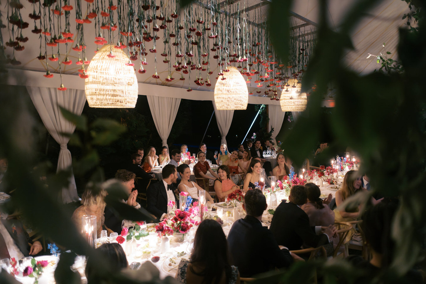 The guests are having fun in the wedding reception dinner candidly captured by Jenny Fu Studio.
