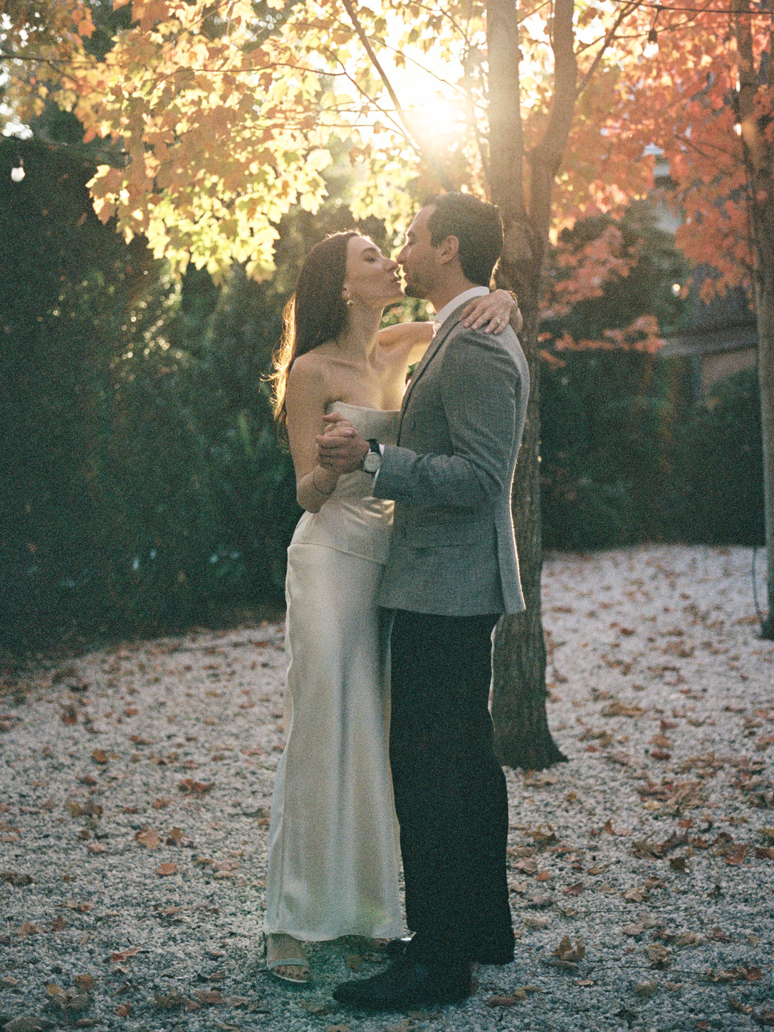 The bride and groom are about to kiss amidst the golden hour in Autumn, ethereal wedding moments captured by Jenny Fu Studio.