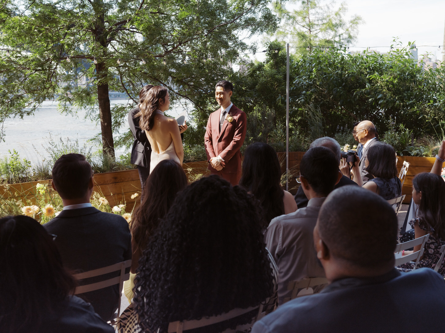 An emotional wedding ceremony held in Celestine, Brooklyn, shot by Jenny Fu Studio.