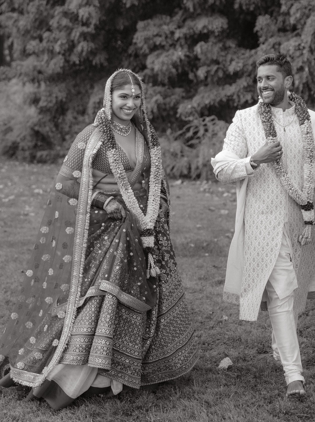The Indian bride and groom wears traditional wedding outfits, captured by Jenny Fu Studio.