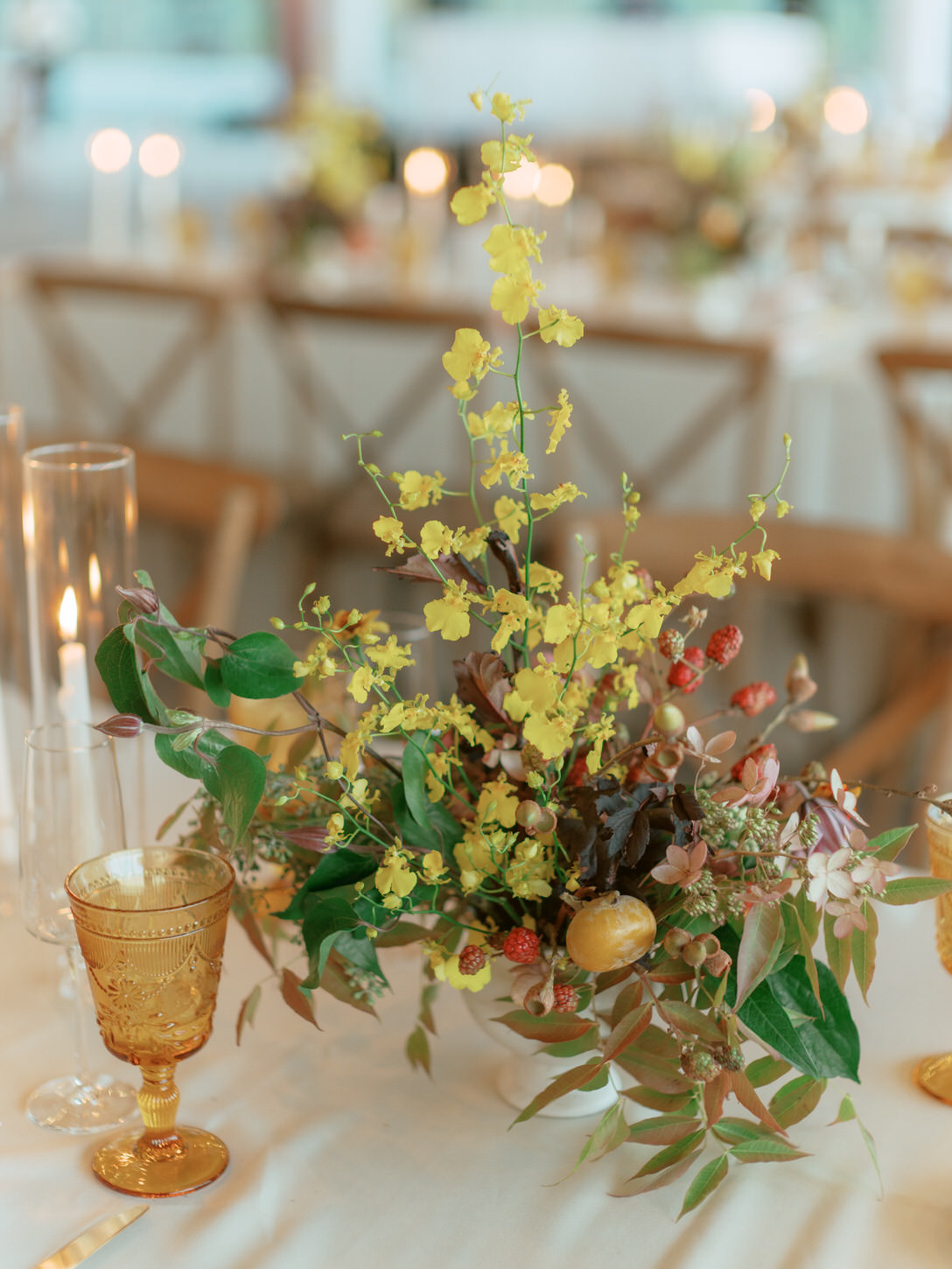 A colorful flower table centerpiece in an Upstate New York wedding, shot by Jenny Fu studio.