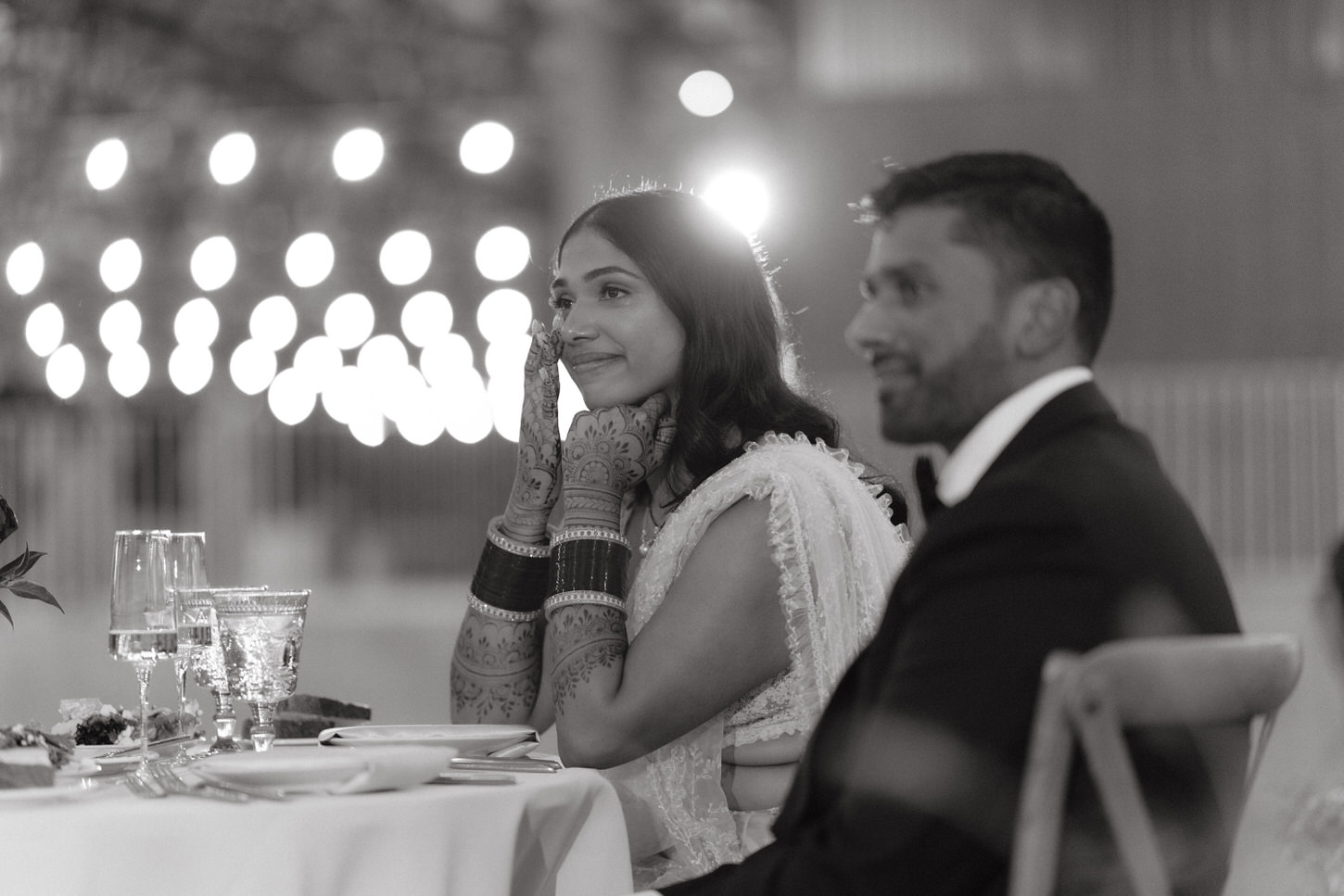 The newlyweds are emotional in their wedding reception, a timeless image captured by Jenny Fu Studio.