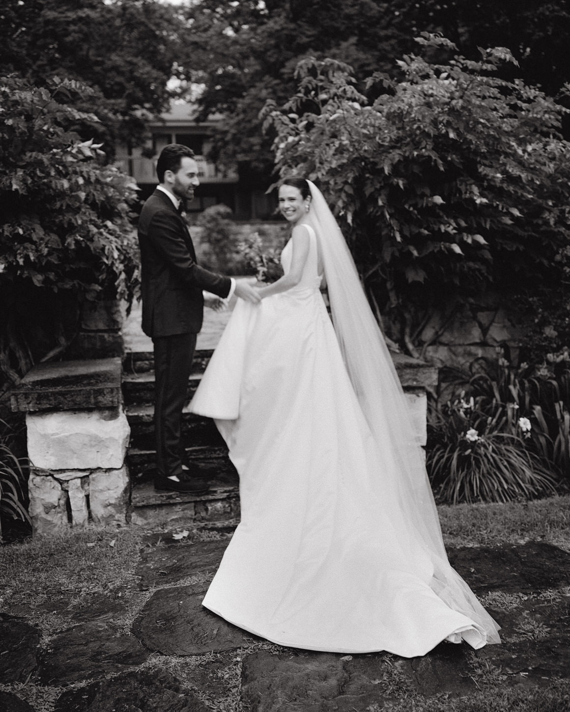 The bride and groom are about to walk the aisle, captured by high-fashion wedding photographer, Jenny Fu Studio.